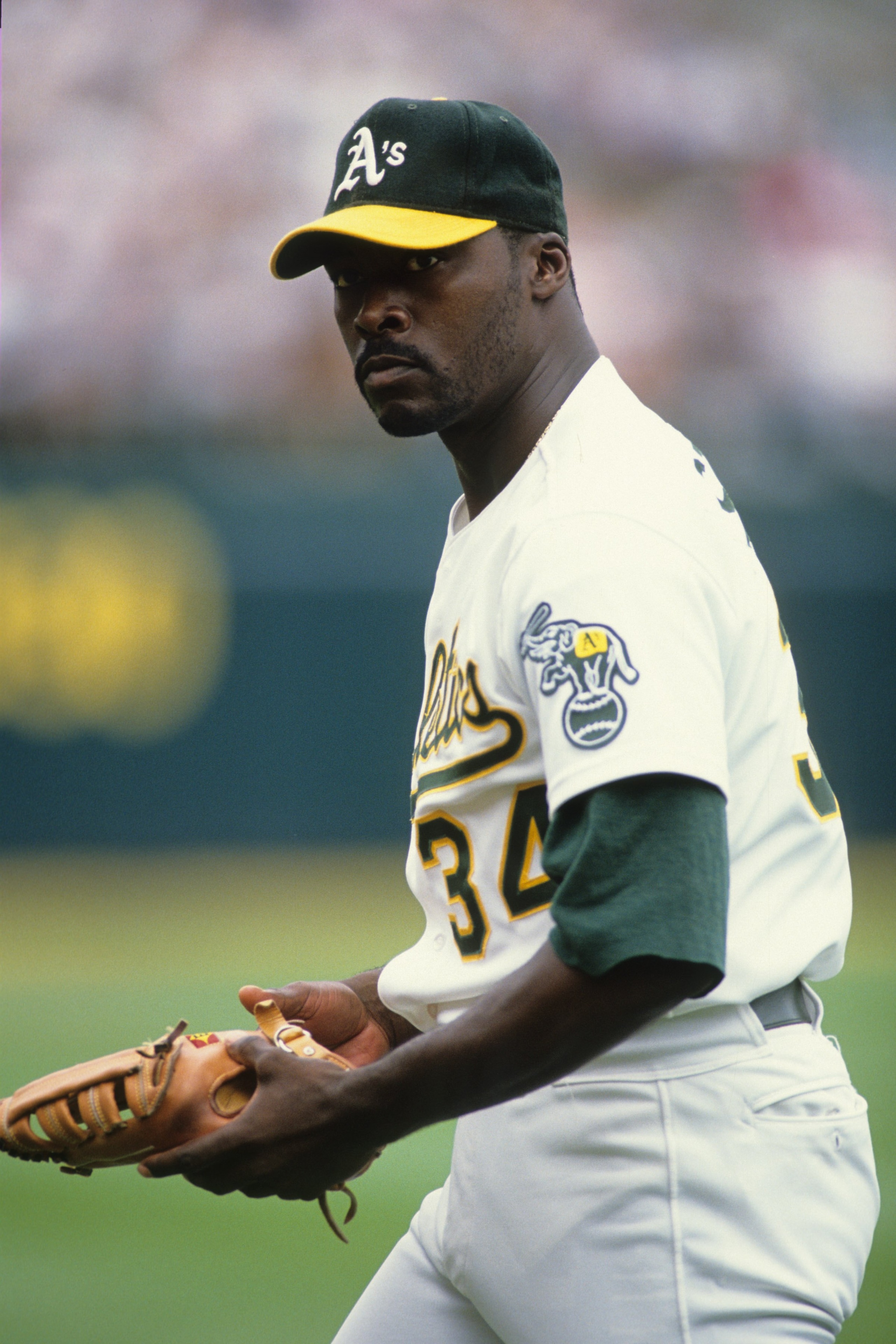 OAKLAND, CA - CIRCA 1990:  Dave Stewart #34 of the Oakland Athletics looks on during an MLB game circa 1990 in Oakland, California. (Photo by Otto Greule Jr./Getty Images)