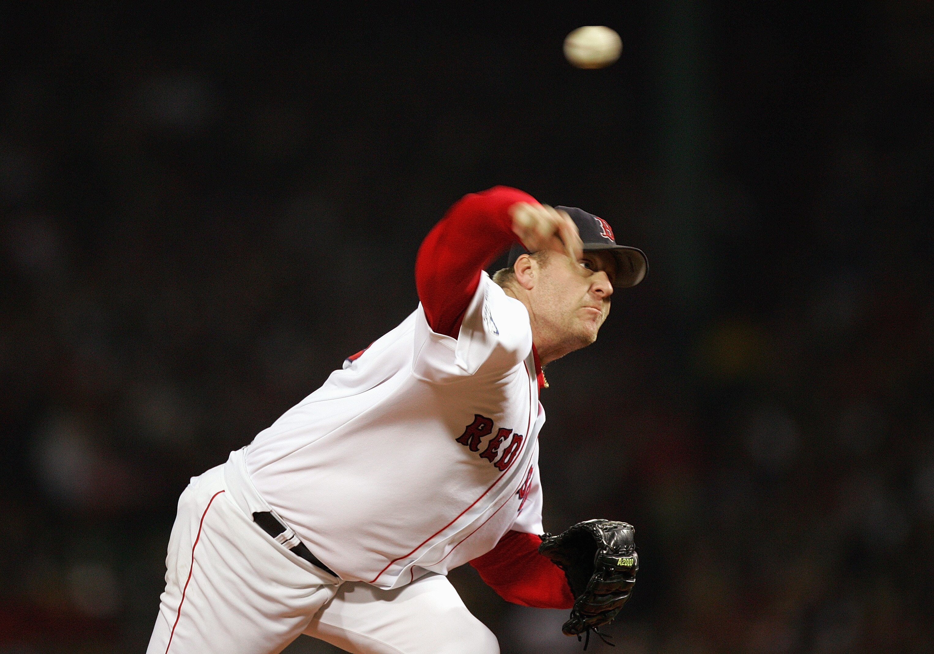 BOSTON - OCTOBER 24:  Curt Schilling #38 of the Boston Red Sox pitches against the St. Louis Cardinals during game two of the 2004 World Series on October 24, 2004 at Fenway Park in Boston, Massachusetts. (Photo by Ezra Shaw/Getty Images)