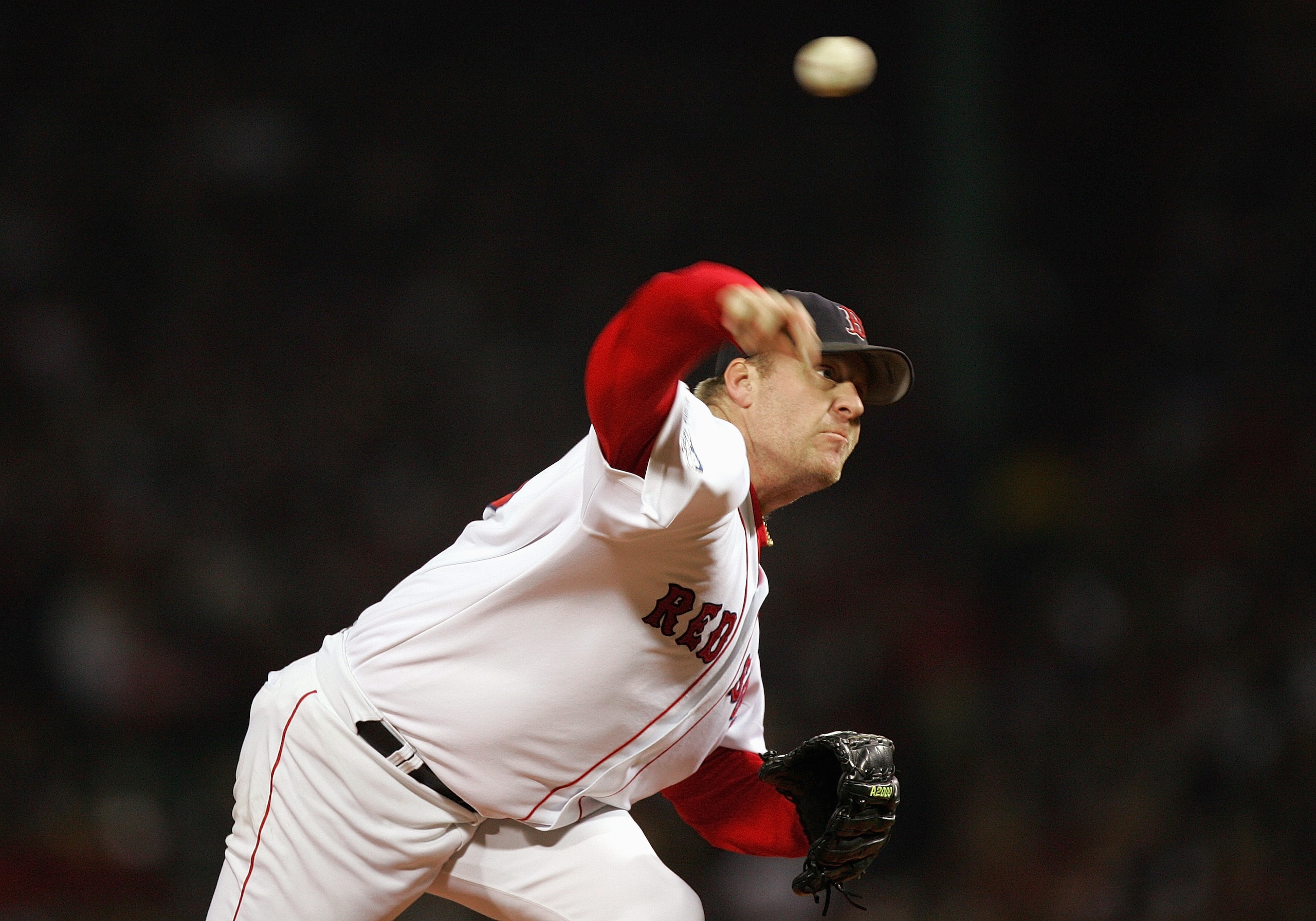 BOSTON - OCTOBER 24:  Curt Schilling #38 of the Boston Red Sox pitches against the St. Louis Cardinals during game two of the 2004 World Series on October 24, 2004 at Fenway Park in Boston, Massachusetts. (Photo by Ezra Shaw/Getty Images)