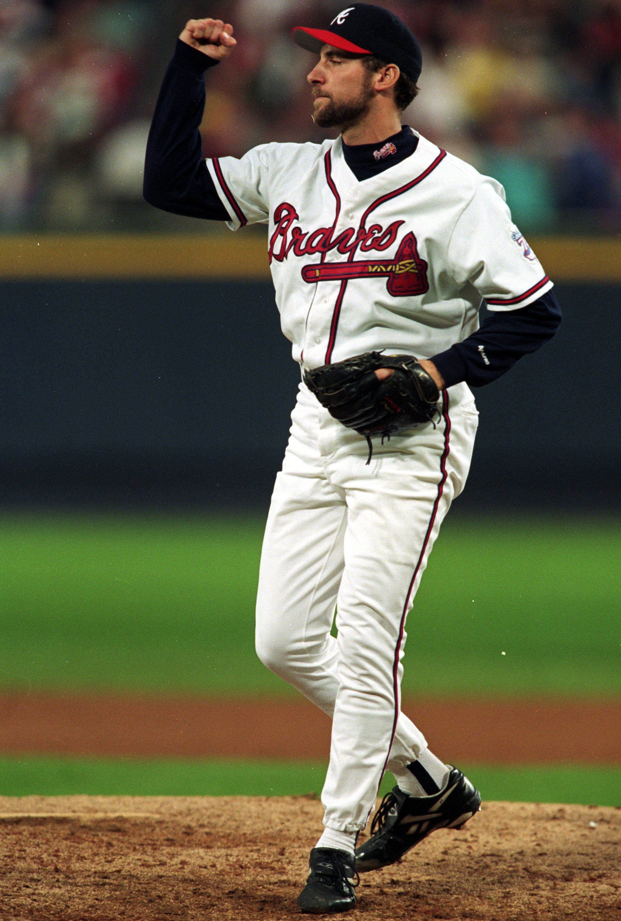 13 Oct 1999: John Smoltz #29 of the Atlanta Braves celebrates at the mound during the National League Conference Series game two against the New York Mets at Turner Field in Atlanta, Georgia. The Braves defeated the Mets 4-3.