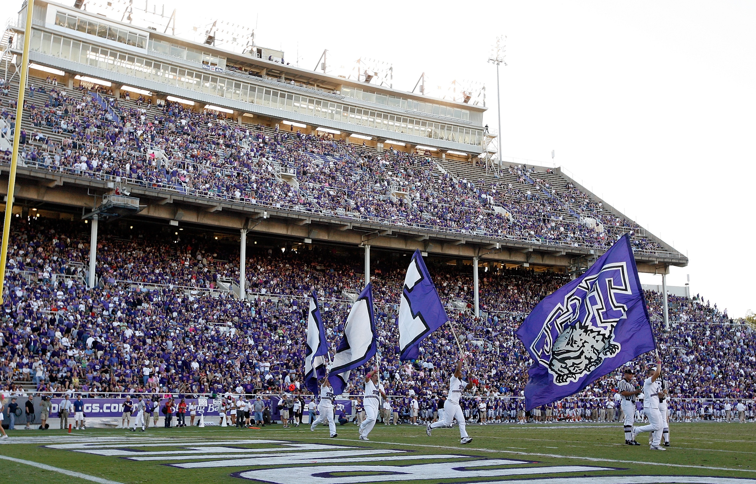 FORT WORTH, TX - OCTOBER 16: TCU Horned Frogs fans fill the stands as TCU takes to the field against the BYU Cougars at Amon G. Carter Stadium on October 16, 2010 in Fort Worth, Texas. TCU beat BYU 31-3. (Photo by Tom Pennington/Getty Images) FORT WORTH, TX - OCTOBER 16: TCU Horned Frogs fans fill the stands as TCU takes to the field against the BYU Cougars at Amon G. Carter Stadium on October 16, 2010 in Fort Worth, Texas. TCU beat BYU 31-3. (Photo by Tom Pennington/Getty Images)