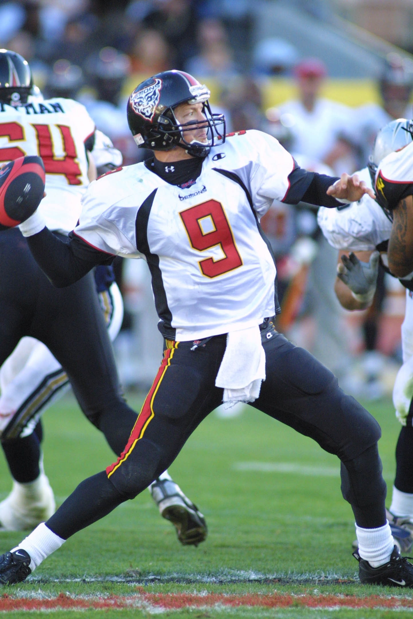 21 Apr 2001:  Mike Pawlawski #9 looks downfield to pass against the Los Angeles Xtreme during the XFL Championship game at the Los Angeles Coliseum in Los Angeles, California.  DIGITAL IMAGE.  Mandatory Credit: Scott Halleran/Allsport
