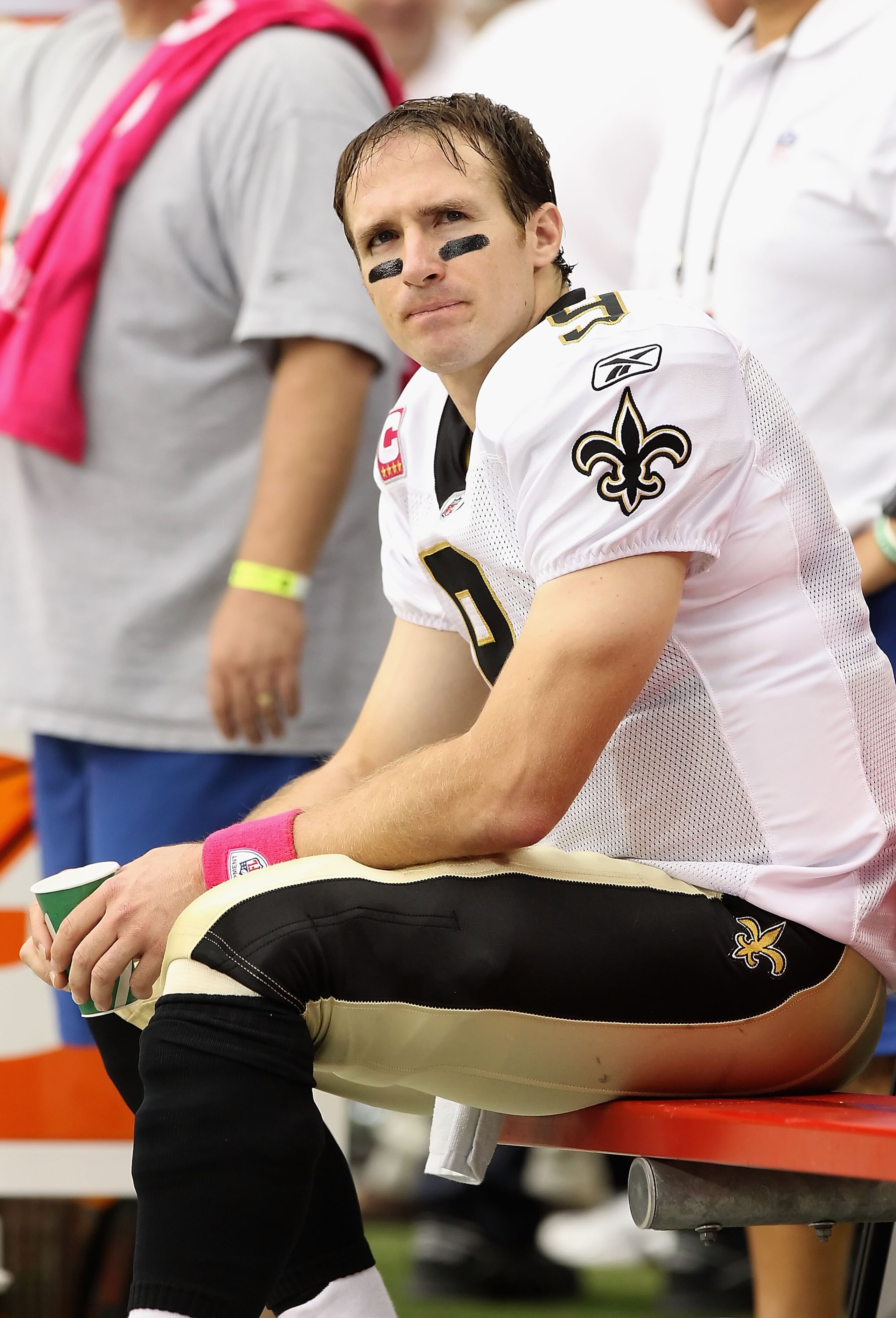 GLENDALE, AZ - OCTOBER 10:  Quarterback Drew Brees #9 of the New Orleans Saints sits on the bench during the NFL game against the Arizona Cardinals at the University of Phoenix Stadium on October 10, 2010 in Glendale, Arizona. The Cardinals defeated the S