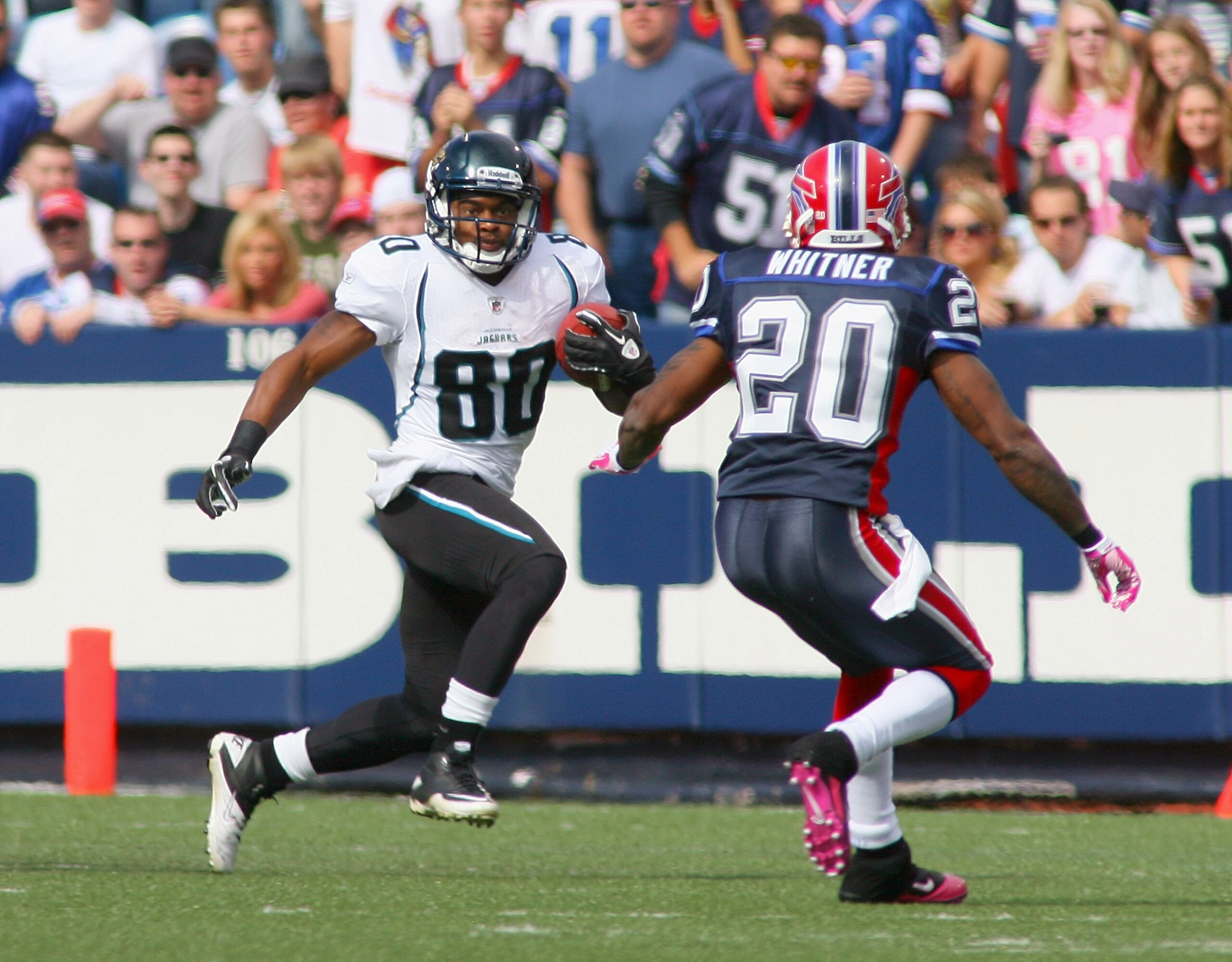 ORCHARD PARK, NY - OCTOBER 10:  Mike Thomas #80 of the Jacksonville Jaguars runs toward Donte Whitner #20  of the Buffalo Bills  at Ralph Wilson Stadium on October 10, 2010 in Orchard Park, New York. Jacksonville won 36-26.  (Photo by Rick Stewart/Getty I