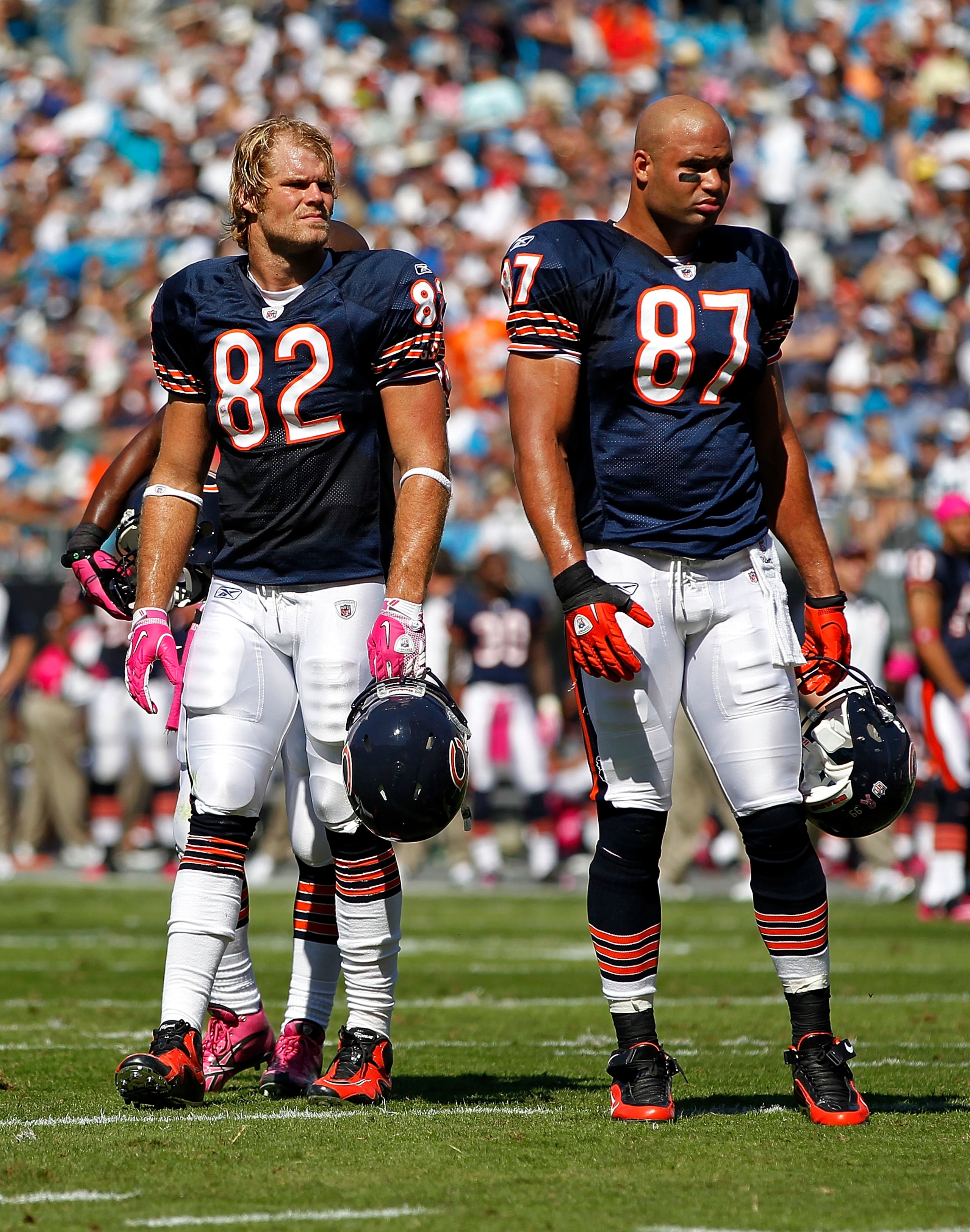CHARLOTTE, NC - OCTOBER 10: Tight end Greg Olsen #82 of the Chicago Bears and tight end Kellen Davis #87 of the Chicago Bears stand on the field during a timeout against the Carolina Panthers at Bank of America Stadium on October 10, 2010 in Charlotte, No