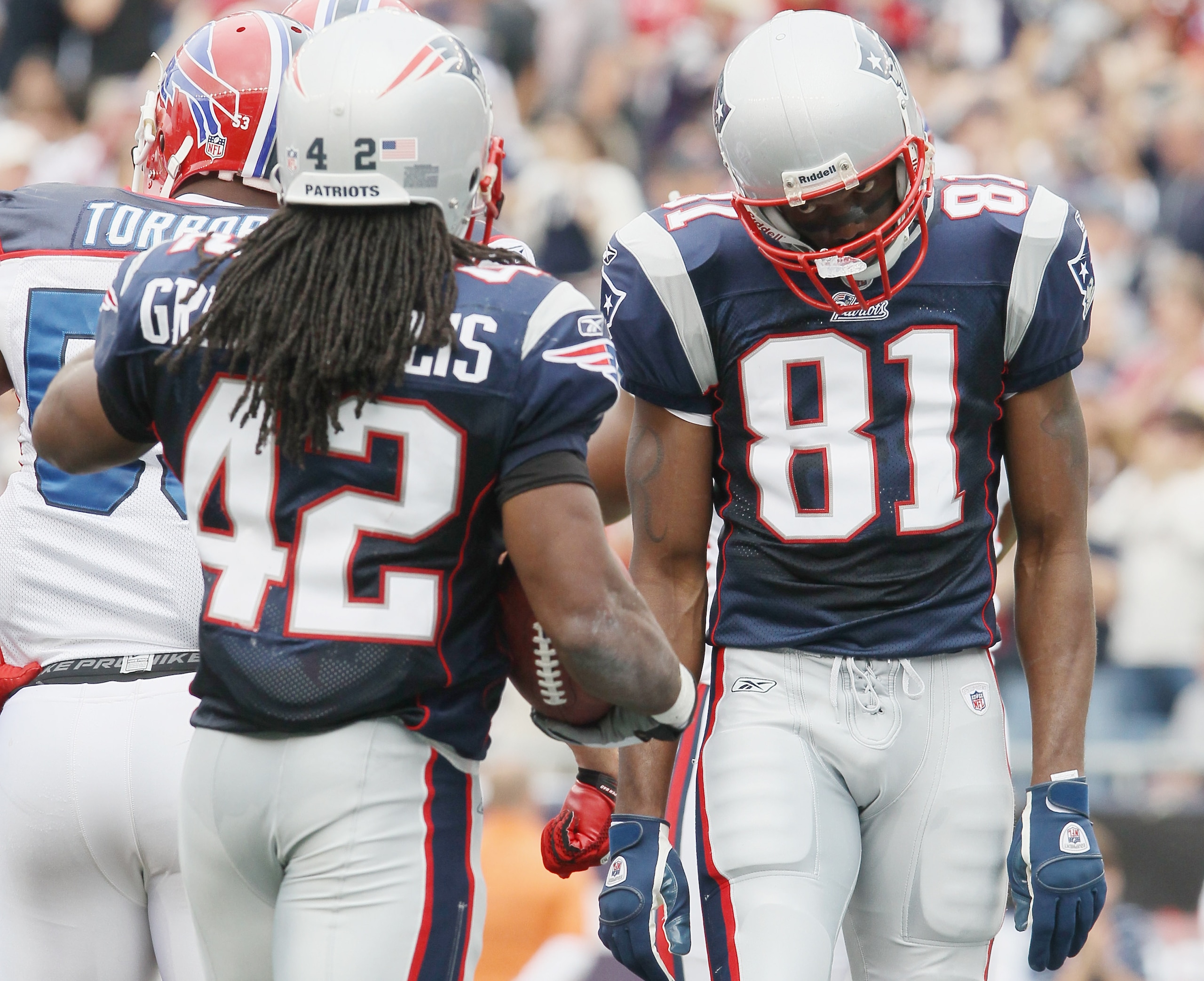 FOXBORO, MA - SEPTEMBER 26:  Randy Moss #81 of the New England Patriots congratulates BenJarvus Green-Ellis #42 after Green-Ellis scored a touchdown against the Buffalo Bills during on September 26, 2010 at Gillette Stadium in Foxboro, Massachusetts. The