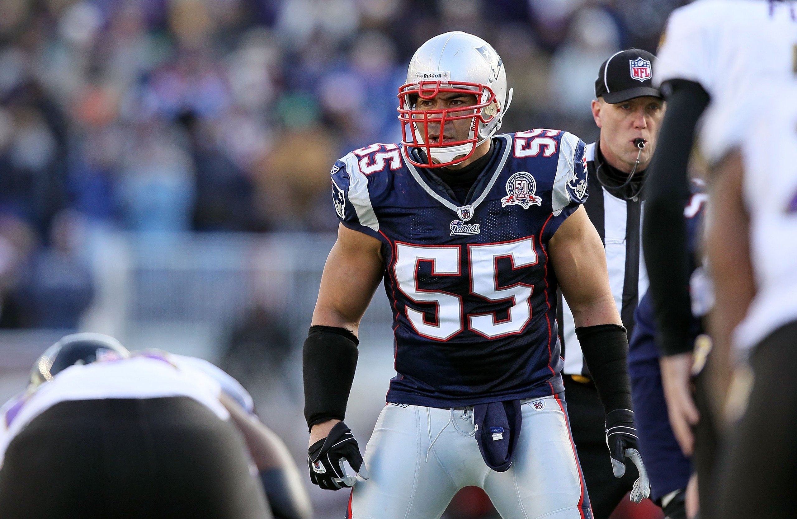 FOXBORO, MA - JANUARY 10:  Junior Seau #55 of the New England Patriots lines up on defense against the Baltimore Ravens during the 2010 AFC wild-card playoff game at Gillette Stadium on January 10, 2010 in Foxboro, Massachusetts. The Ravens won 33-14. (Ph