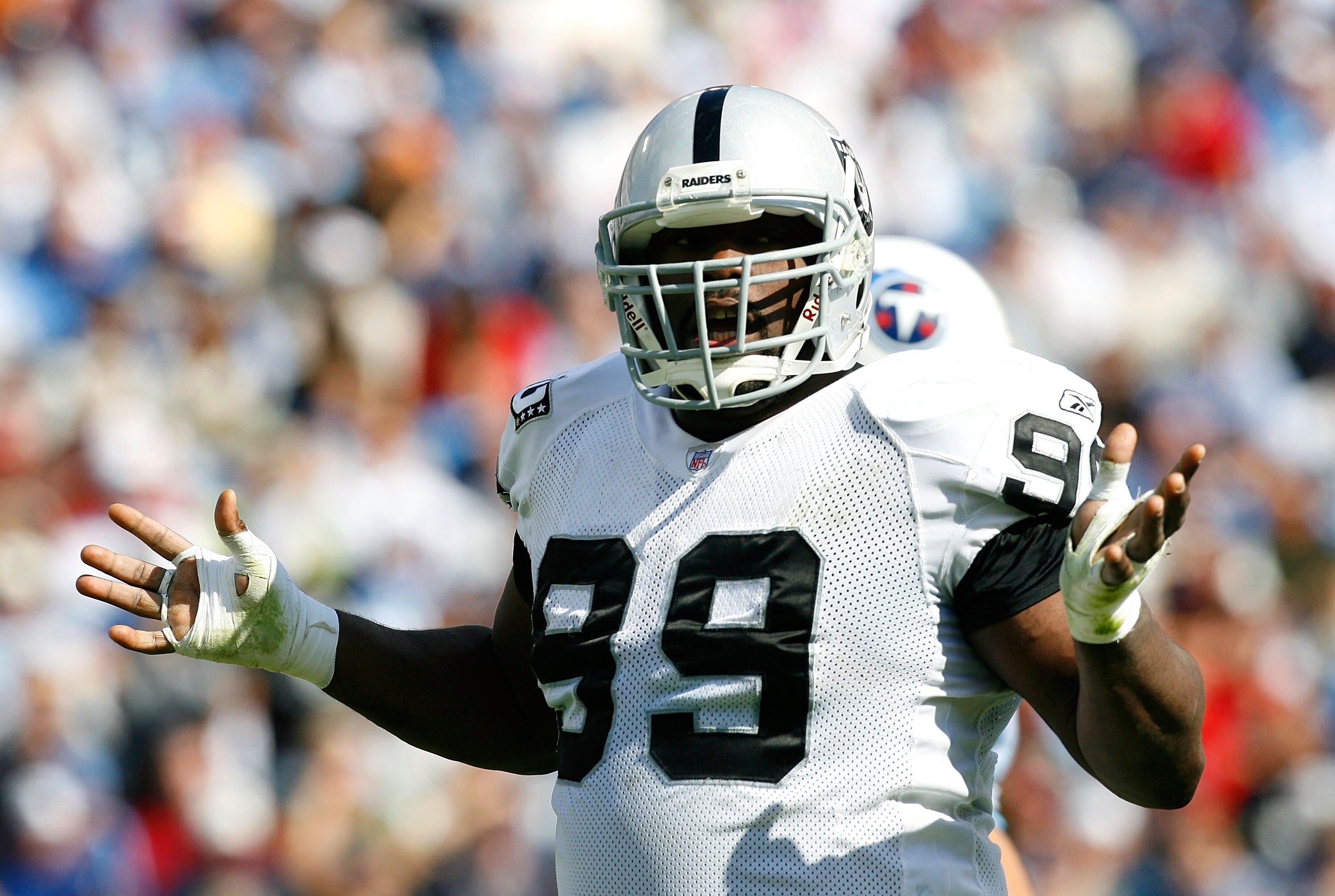 NASHVILLE, TN - OCTOBER 28:  Defensive tackle Warren Sapp #99 of the Oakland Raiders gestures to the fans after sacking quarterback Vince Young #10 of the Tennessee Titans during the first half at LP Field October 28, 2007 in Nashville, Tennessee.  (Photo