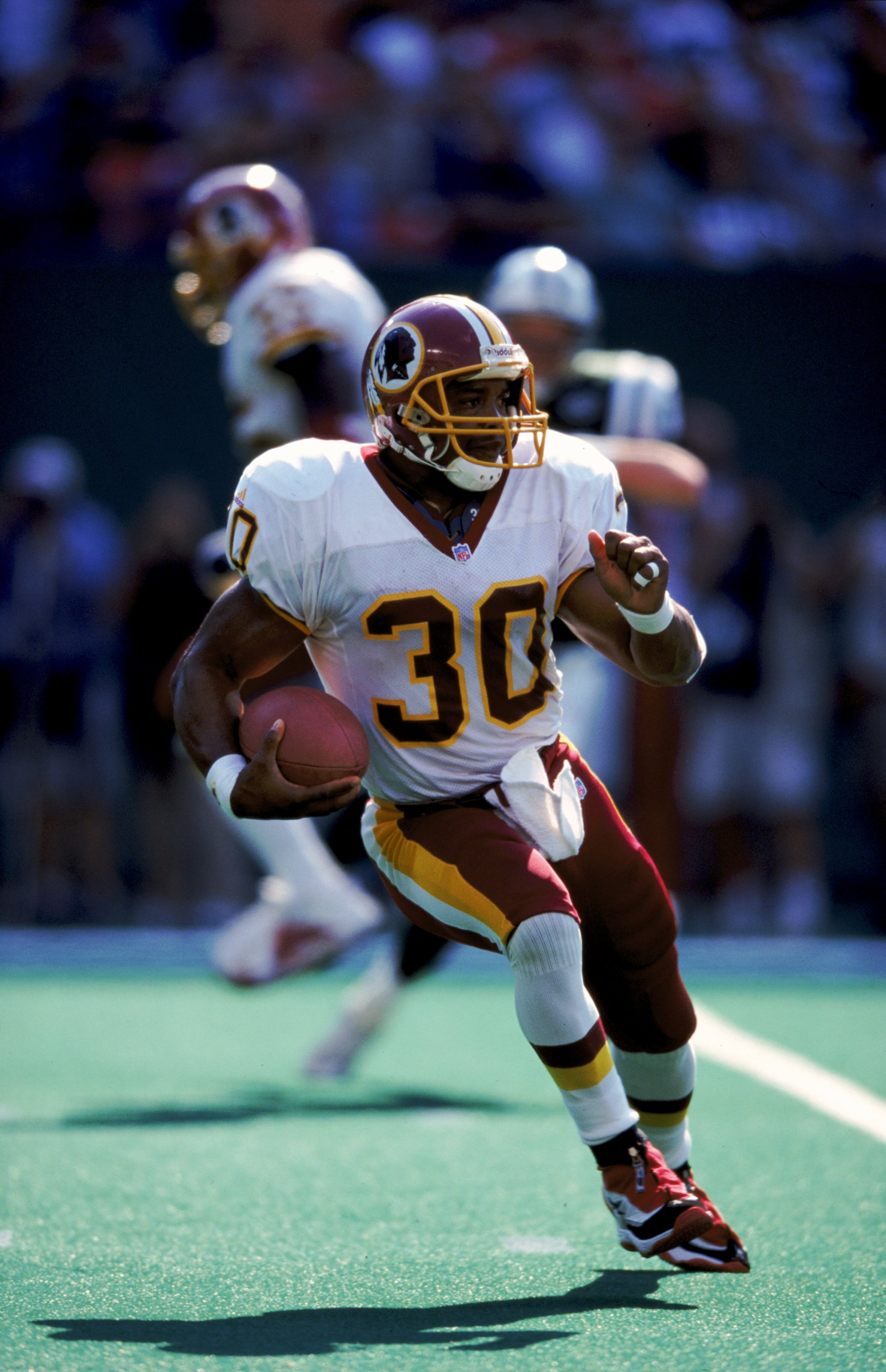 26 Sep 1999: Brian Mitchell #30 of the Washington Redskins runs with the ball during the game against the New York Jets at the Giants Stadium in East Rutherford, New Jersey. The Redskins defeated the Jets 27-20. Mandatory Credit: Ezra O. Shaw /Allsport 26 Sep 1999: Brian Mitchell #30 of the Washington Redskins runs with the ball during the game against the New York Jets at the Giants Stadium in East Rutherford, New Jersey. The Redskins defeated the Jets 27-20. Mandatory Credit: Ezra O. Shaw /Allsport