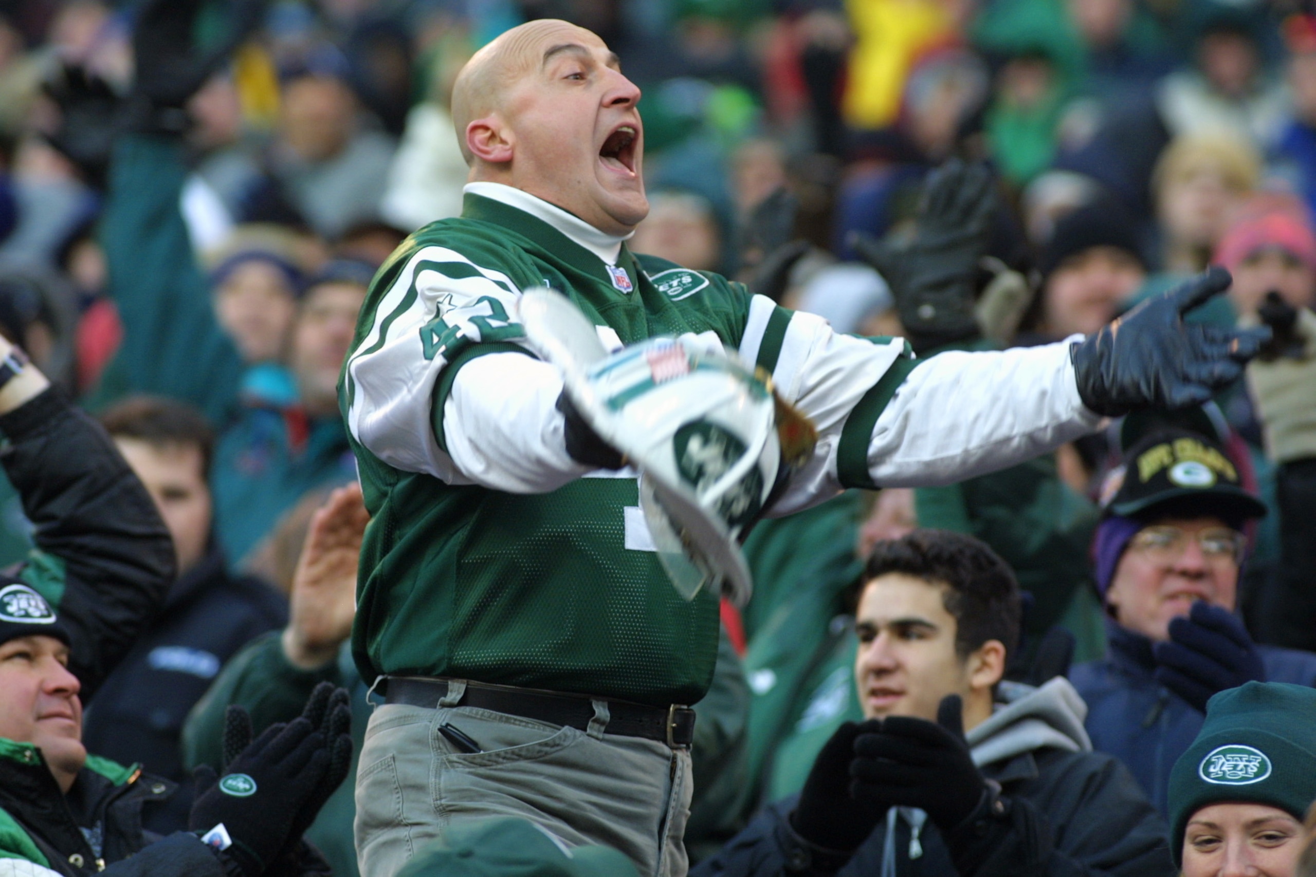 30 Dec 2001: Fan and firefighter Ed Anzalone cheers on the New York Jets against the Buffalo Bills during the game at Giants Stadium in East Rutherford, New Jersey. The Jets won 14-9. DIGITAL IMAGE. Mandatory Credit: Al Bello/Getty Images 30 Dec 2001: Fan and firefighter Ed Anzalone cheers on the New York Jets against the Buffalo Bills during the game at Giants Stadium in East Rutherford, New Jersey. The Jets won 14-9. DIGITAL IMAGE. Mandatory Credit: Al Bello/Getty Images