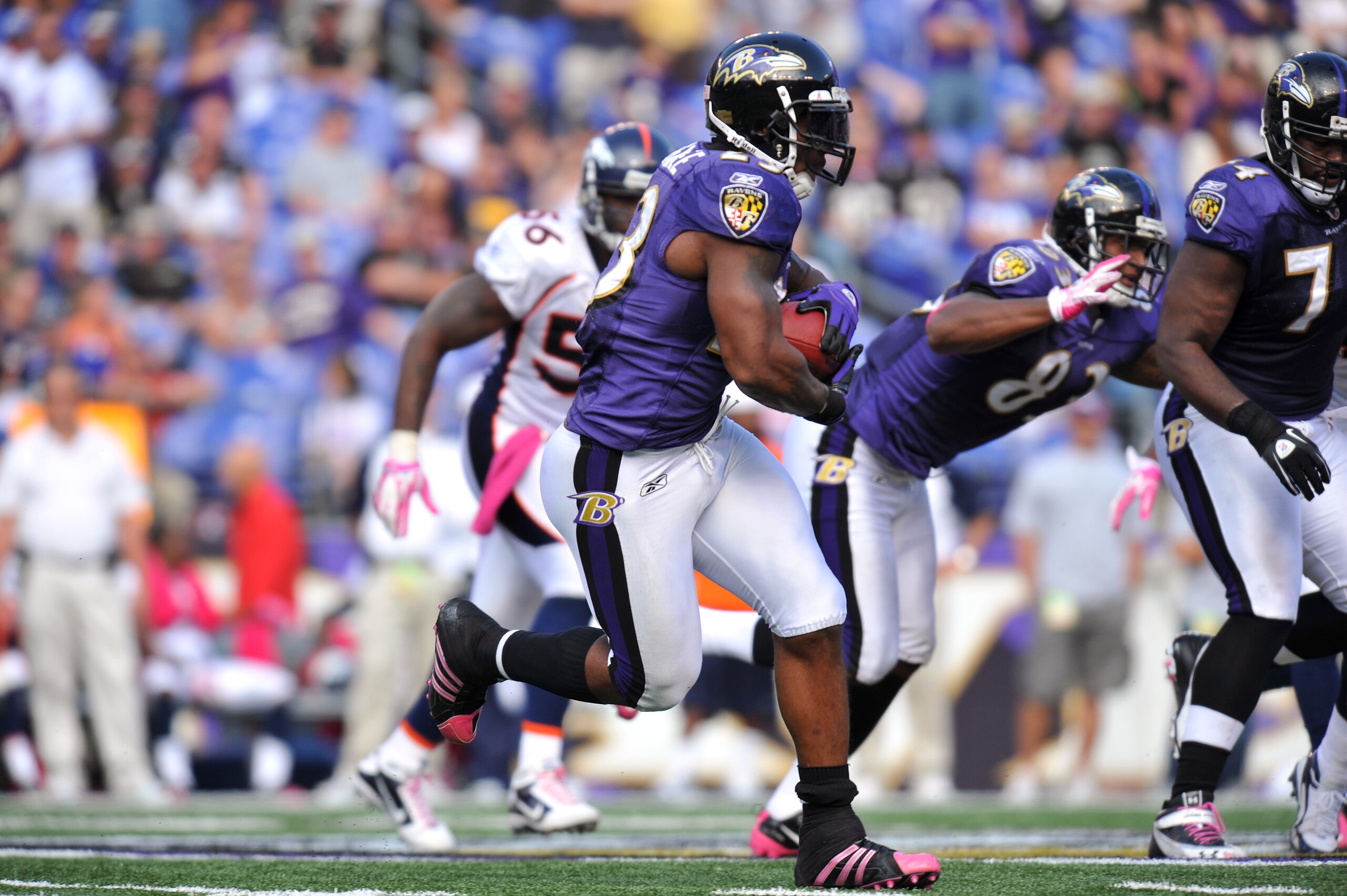BALTIMORE, MD - OCTOBER 10:  Willis McGahee #23 of the Baltimore Ravens runs the ball against the Denver Broncos at M&T Bank Stadium on October 10, 2010 in Baltimore, Maryland. Players wore pink in recognition of Breast Cancer Awareness Month. The Ravens