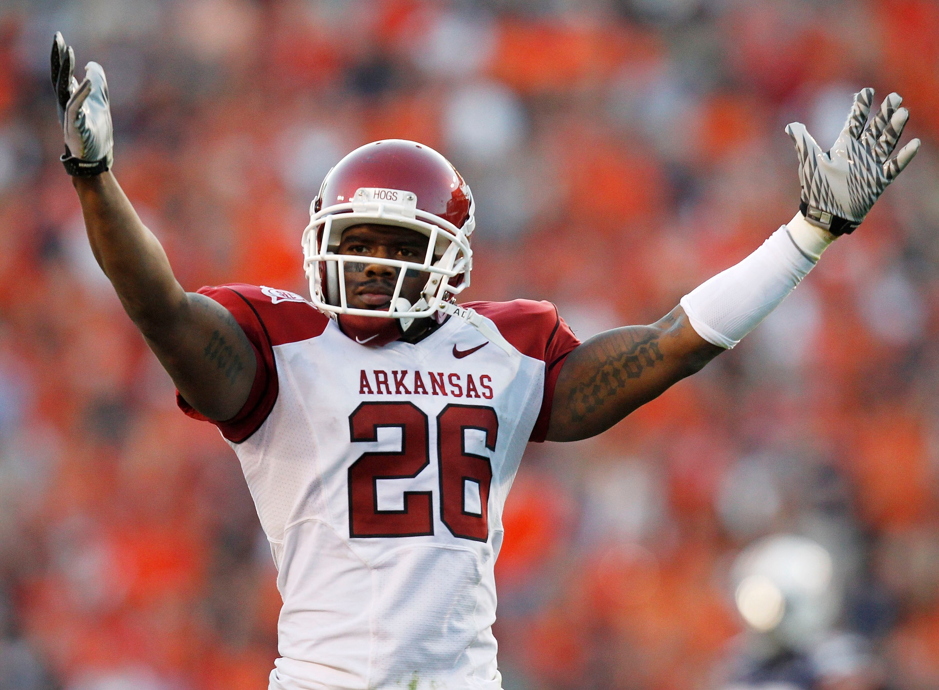 AUBURN - OCTOBER 16:  Cornerback Ramon Broadway #26 of the Arkansas Razorbacks signals to the crowd during the game against the Auburn Tigers at Jordan-Hare Stadium on October 16, 2010 in Auburn, Alabama.  The Tigers beat the Razorbacks 65-43.  (Photo by