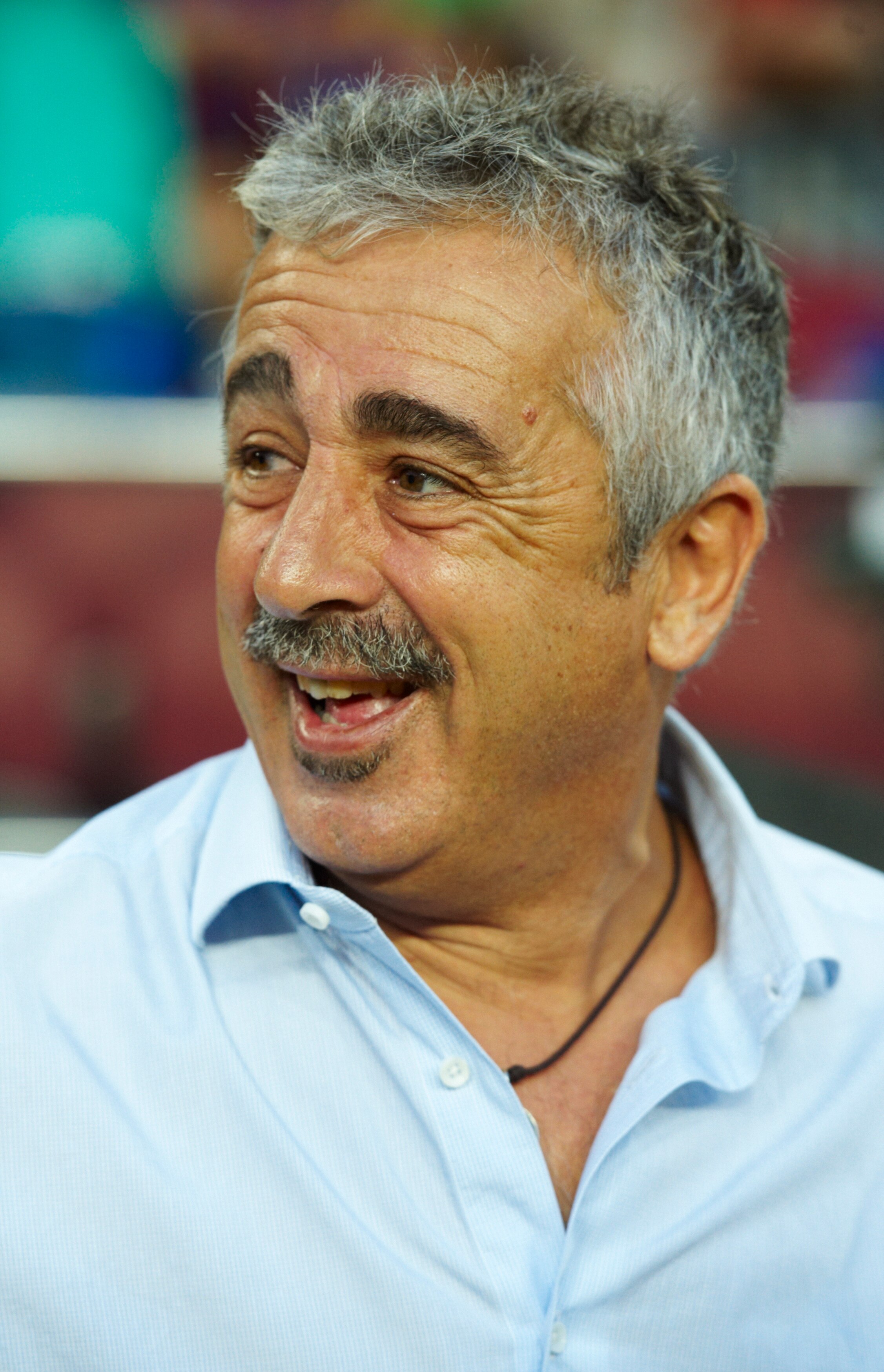 BARCELONA, SPAIN - SEPTEMBER 22:  Head coach Manuel Preciado of Sporting de Gijon smiles before the La Liga match between Barcelona and Sporting de Gijon at Nou Camp on September 22, 2010 in Barcelona, Spain. Barcelona won 1-0.  (Photo by Manuel Queimadel
