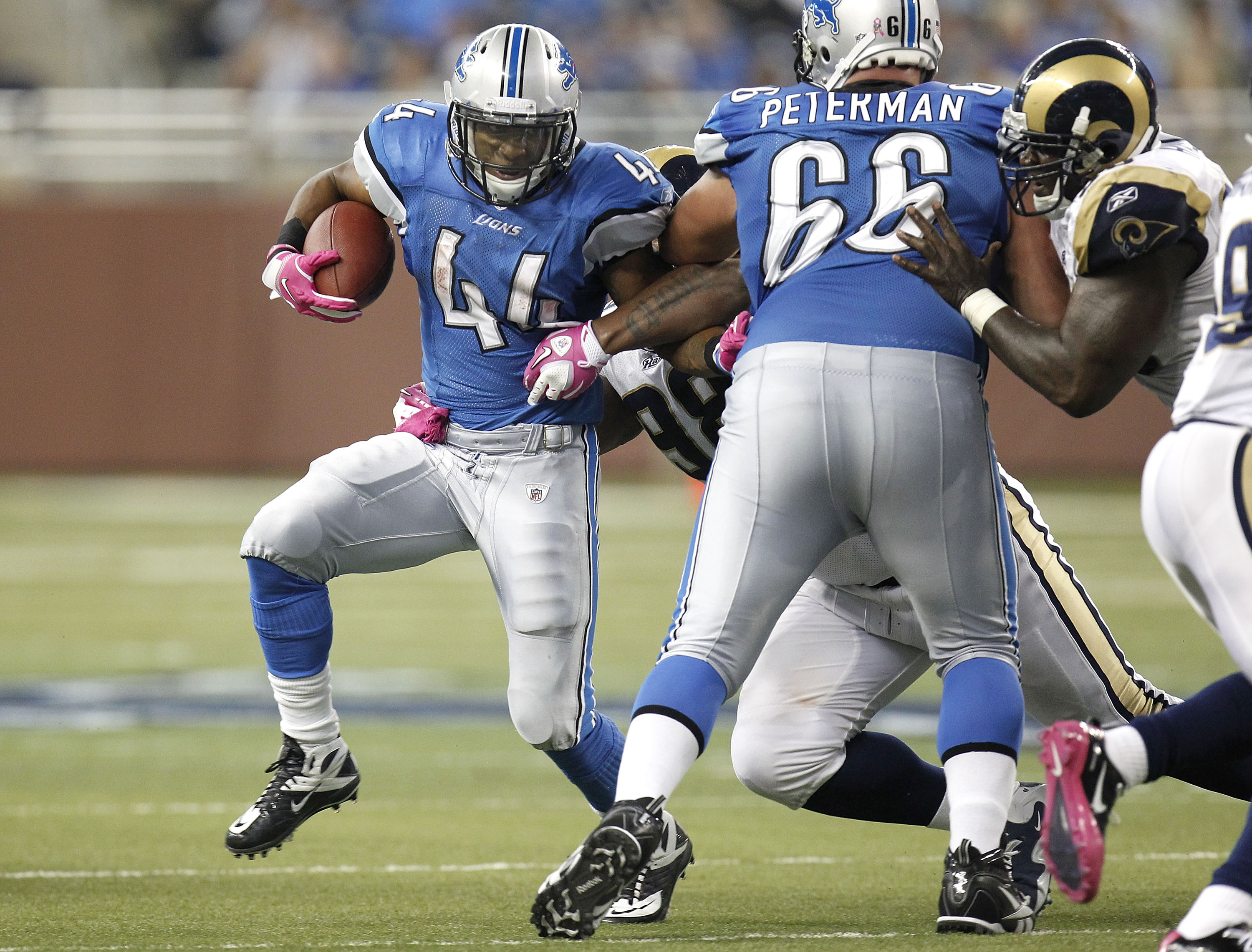 DETROIT - OCTOBER 10: Jahvid Best #44 of the Detroit Lions tries to get around Stephen Peterman #66 of the St. Louis Rams for a third quarter touchdown on October 10, 2010 at Ford Field in Detroit, Michigan. Detroit won the game 44-6. (Photo by Gregory Sh
