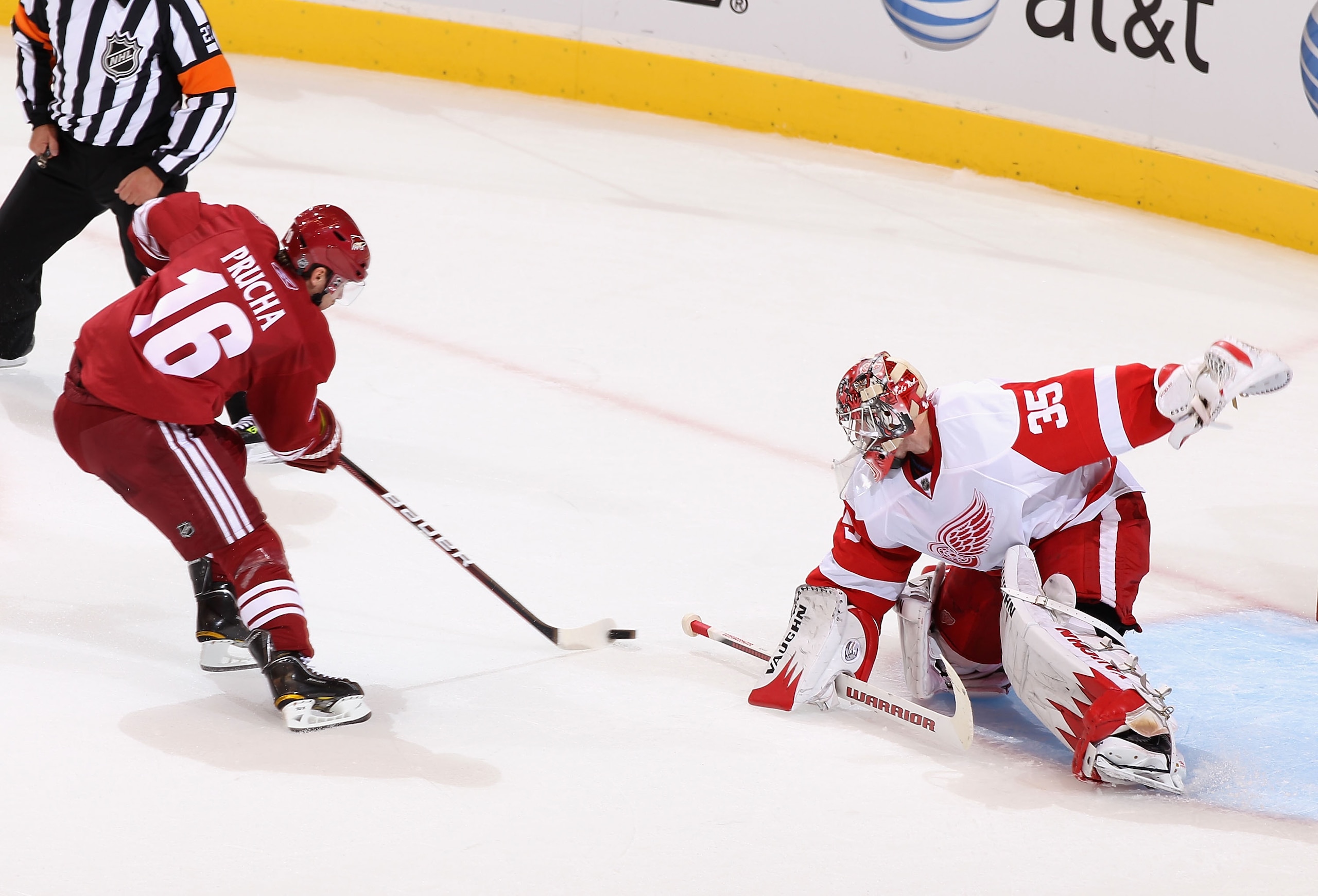 GLENDALE, AZ - OCTOBER 16:  Goaltedner Jimmy Howard #35 of the Detroit Red Wings makes a save on the break away shot from Petr Prucha #16 of the Phoenix Coyotes during the NHL game at Jobing.com Arena on October16, 2010 in Glendale, Arizona.  (Photo by Ch