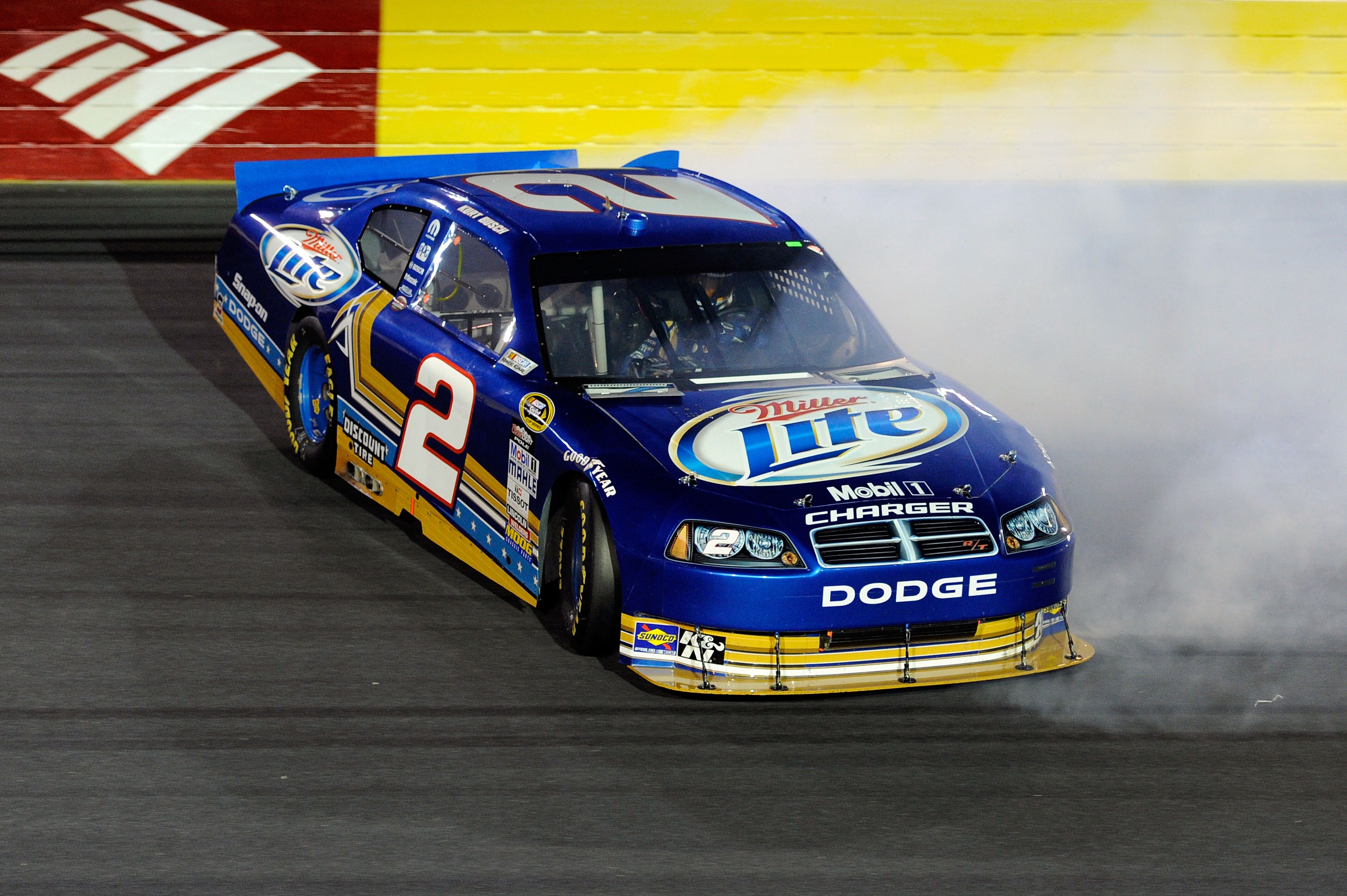 CONCORD, NC - OCTOBER 16:  Kurt Busch, driver of the #2 Operation Home Front/Miller Lite Dodge, spins out after an incident in the NASCAR Sprint Cup Series Bank of America 500 at Charlotte Motor Speedway on October 16, 2010 in Concord, North Carolina.  (P