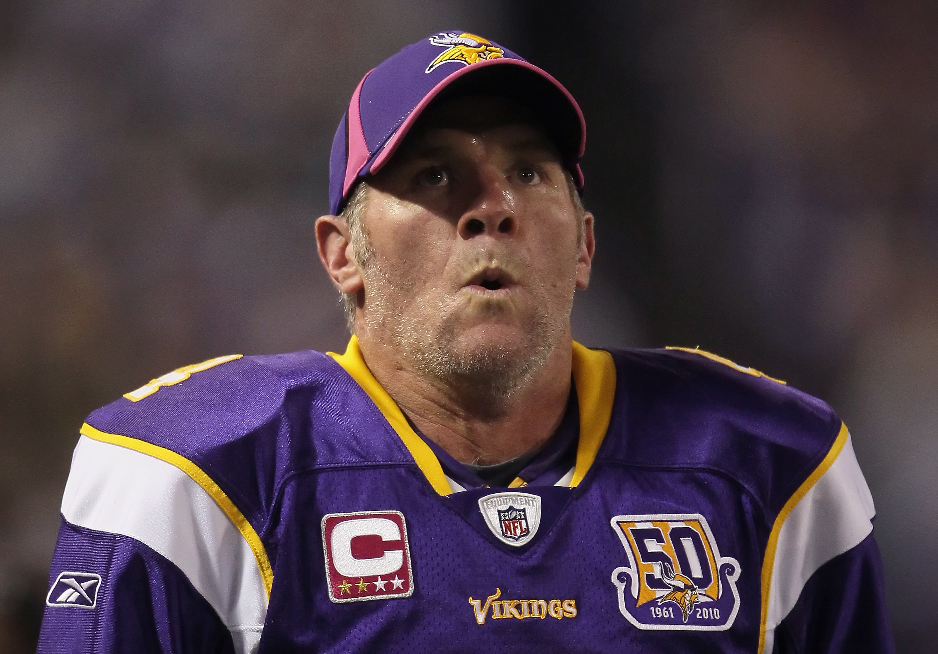 MINNEAPOLIS - OCTOBER 17:  Quarterback Brett Favre #4 of the Minnesota Vikings looks on during the game against the Dallas Cowboys at Mall of America Field on October 17, 2010 in Minneapolis, Minnesota. The Vikings defeated the Cowboys 24-21.  (Photo by J