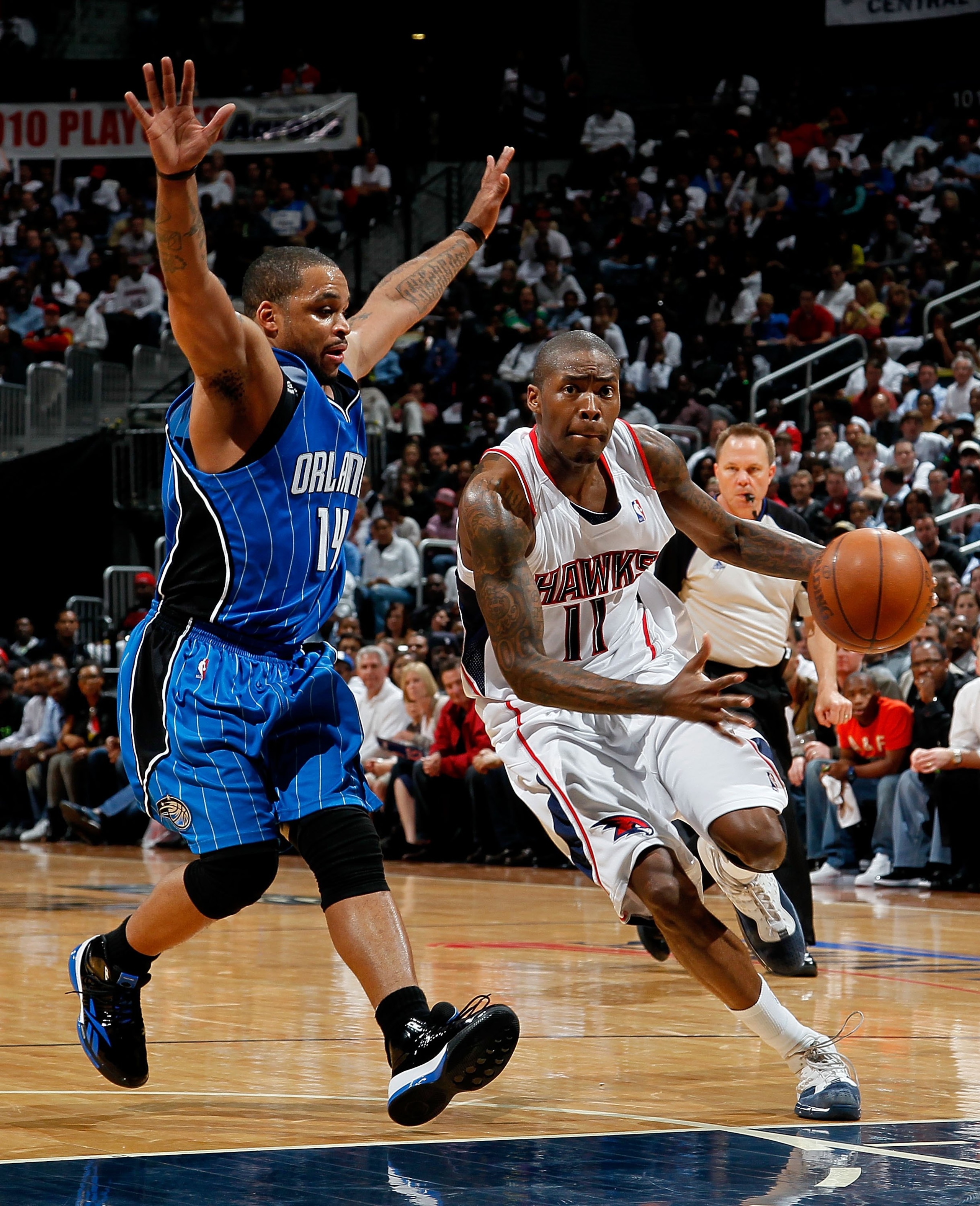 ATLANTA - MAY 10:  Jameer Nelson #14 of the Orlando Magic against Jamal Crawford #11 of the Atlanta Hawks during Game Four of the Eastern Conference Semifinals of the 2010 NBA Playoffs at Philips Arena on May 10, 2010 in Atlanta, Georgia.  NOTE TO USER: U