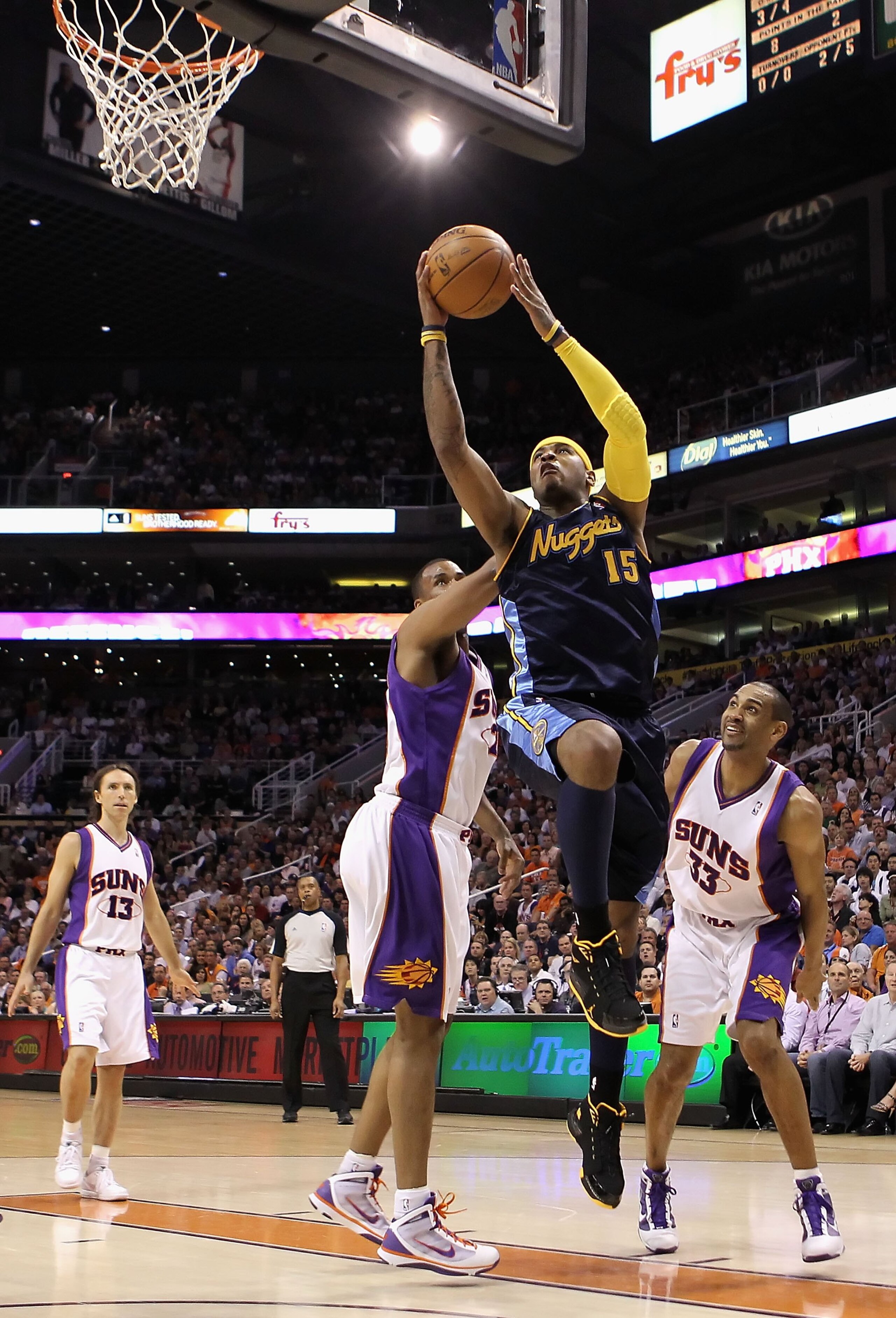 PHOENIX - APRIL 13:  Carmelo Anthony #15 of the Denver Nuggets puts up a shot during the NBA game against the Phoenix Suns at US Airways Center on April 13, 2010 in Phoenix, Arizona. The Suns defeated the Nuggets 123-101.  NOTE TO USER: User expressly ack