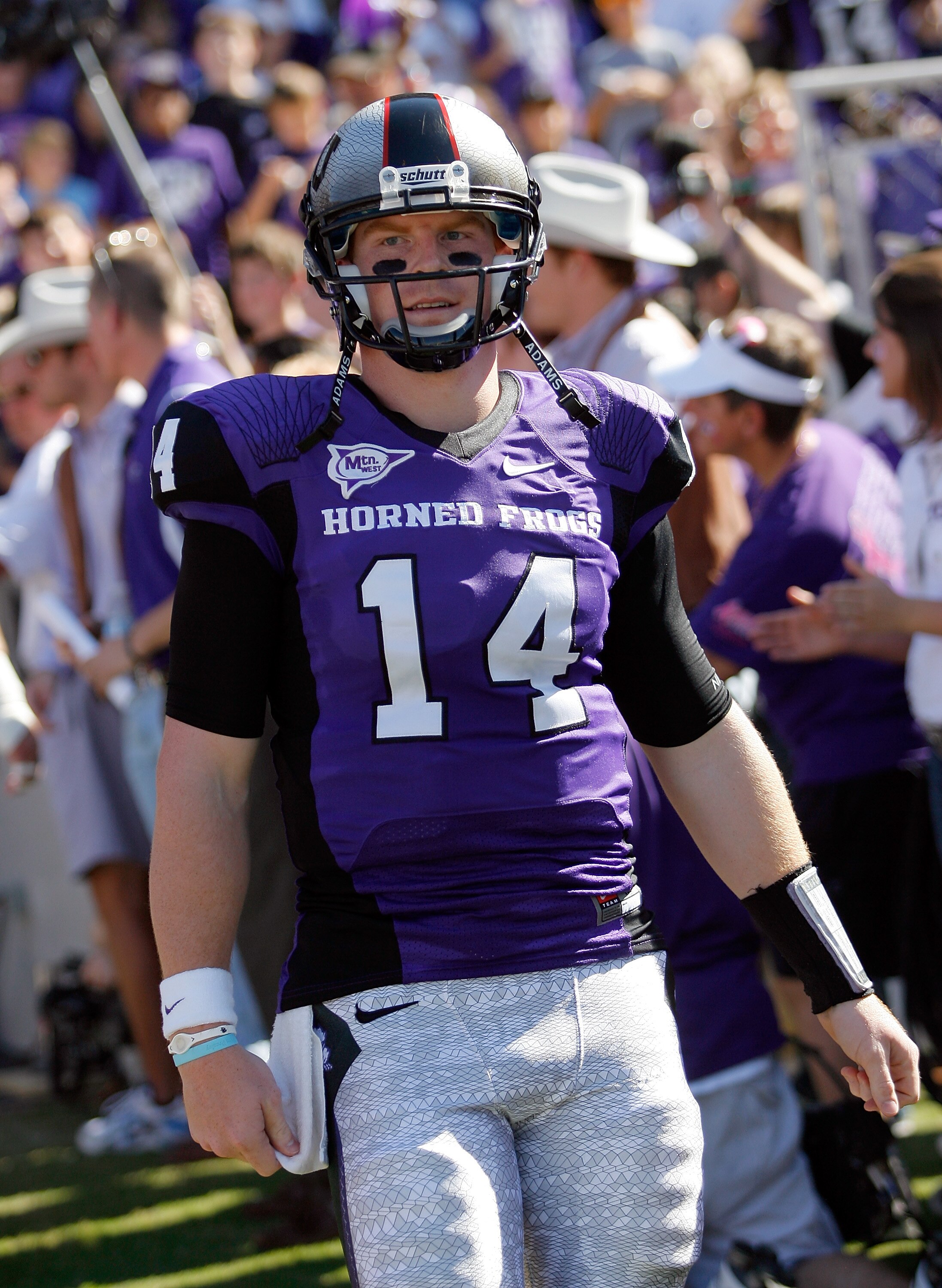 FORT WORTH, TX - OCTOBER 16:  Quarterback Andy Dalton #14 of the TCU Horned Frogs walks on the field against the BYU Cougars at Amon G. Carter Stadium on October 16, 2010 in Fort Worth, Texas. TCU beat BYU 31-3. (Photo by Tom Pennington/Getty Images)
