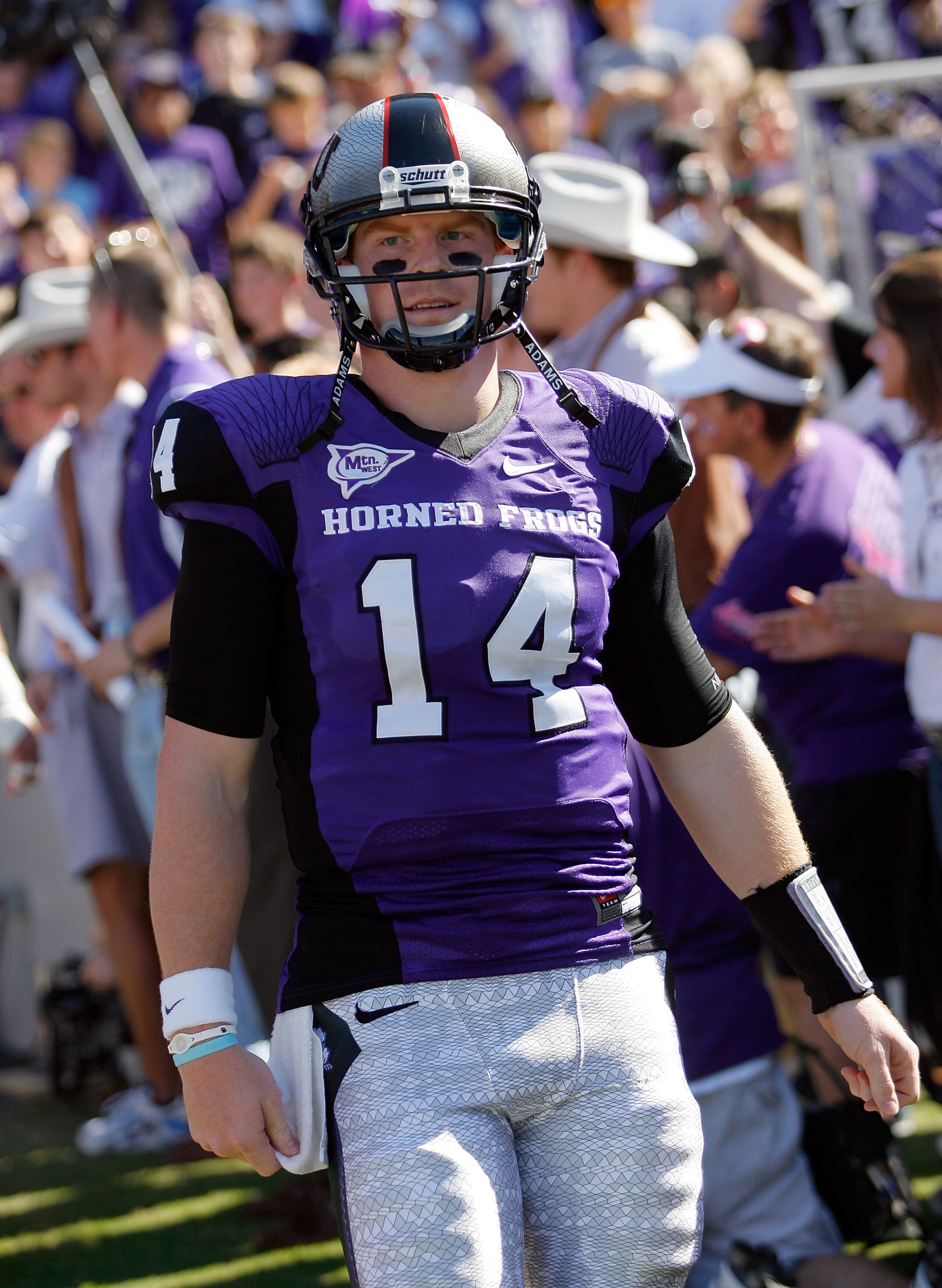 FORT WORTH, TX - OCTOBER 16:  Quarterback Andy Dalton #14 of the TCU Horned Frogs walks on the field against the BYU Cougars at Amon G. Carter Stadium on October 16, 2010 in Fort Worth, Texas. TCU beat BYU 31-3. (Photo by Tom Pennington/Getty Images)