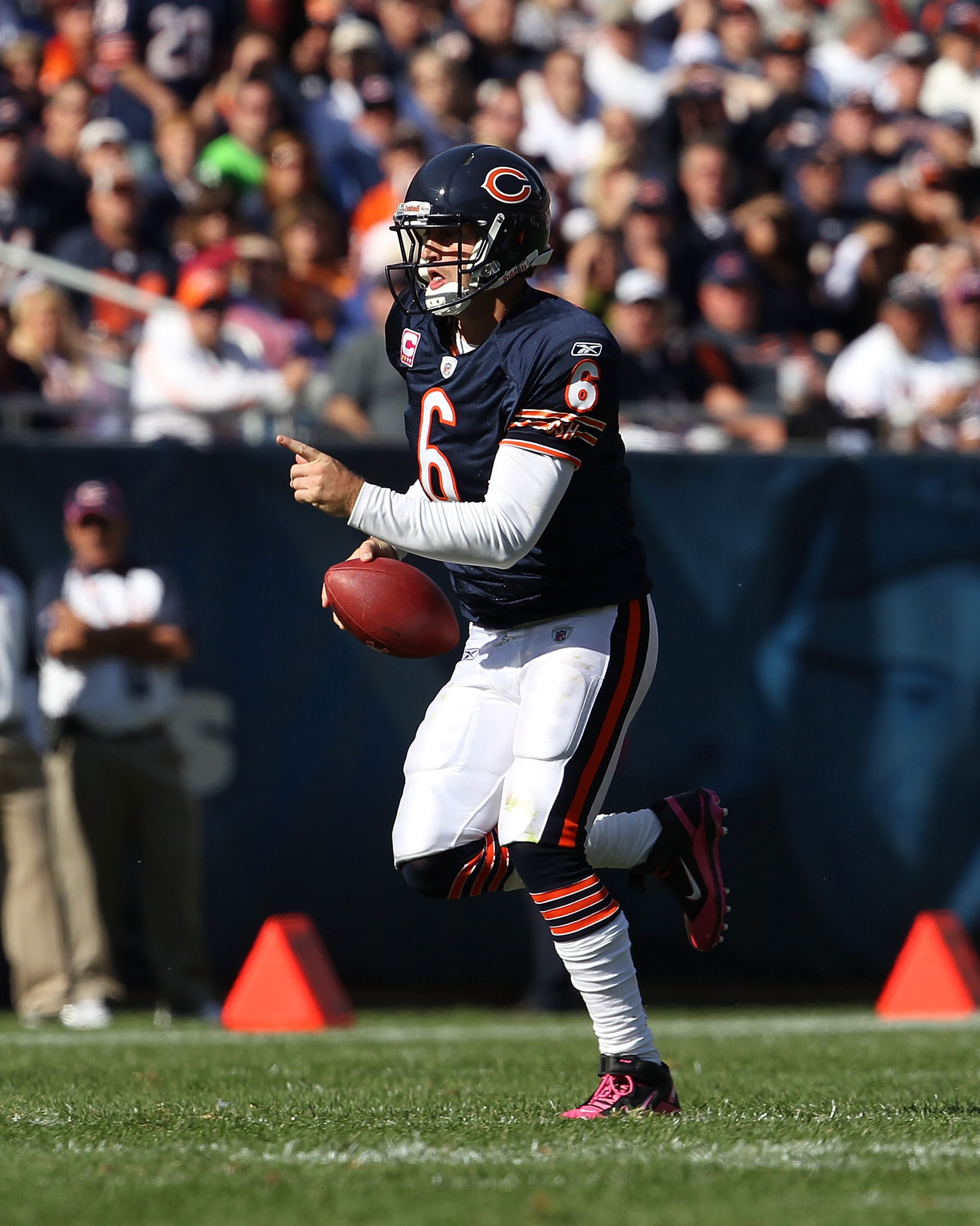 CHICAGO - OCTOBER 17: Jay Cutler #6 of the Chicago Bears runs for a first down against the Seattle Seahawks at Soldier Field on October 17, 2010 in Chicago, Illinois. The Seahawks defeated the Bears 23-20. (Photo by Jonathan Daniel/Getty Images)