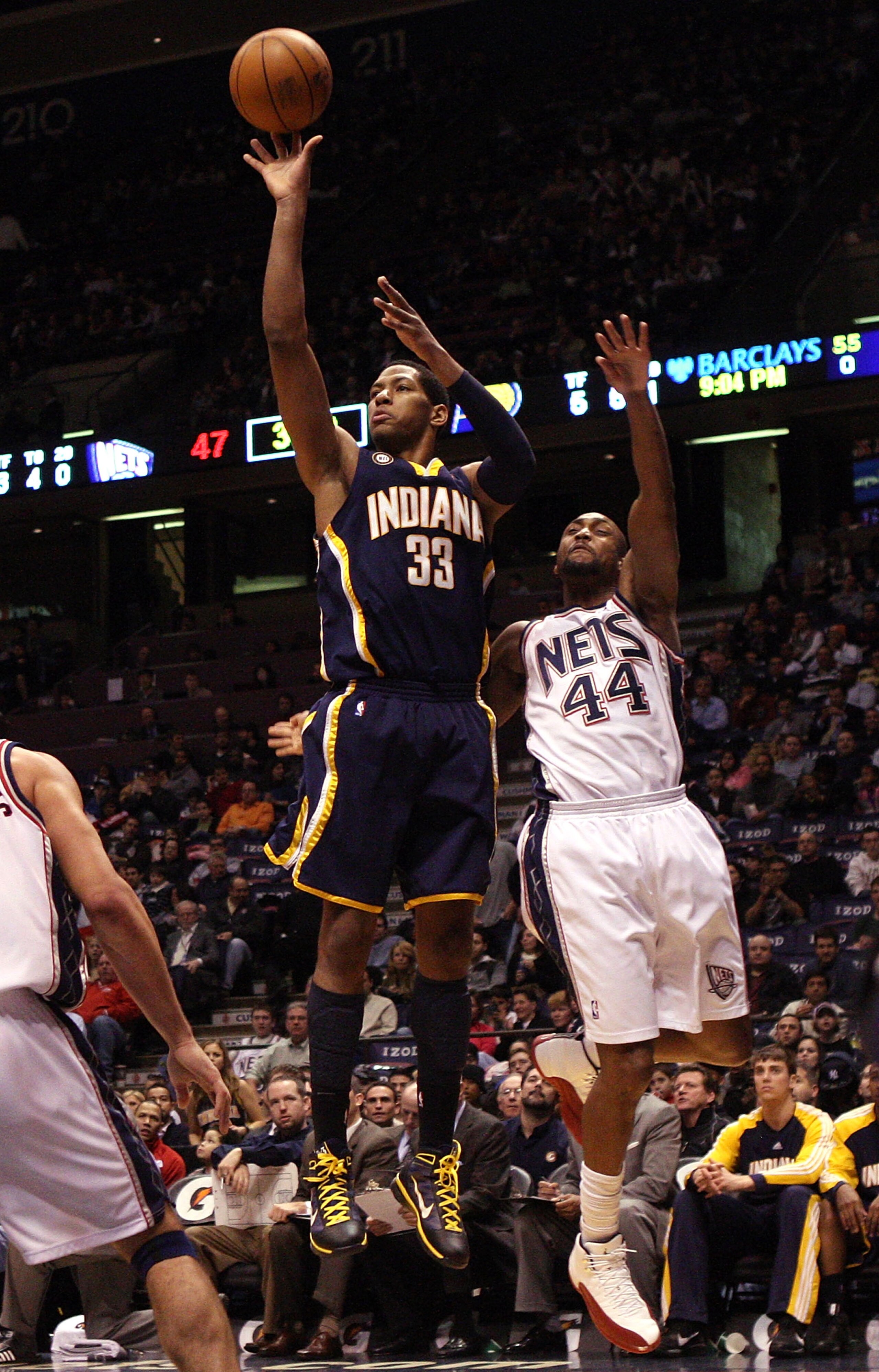 EAST RUTHERFORD, NJ - JANUARY 15:  Danny Granger #33 of the Indiana Pacers shoots against Trenton Hassell #44 of the New Jersey Nets at the Izod Center on January 15, 2010 in East Rutherford, New Jersey. NOTE TO USER: User expressly acknowledges and agree