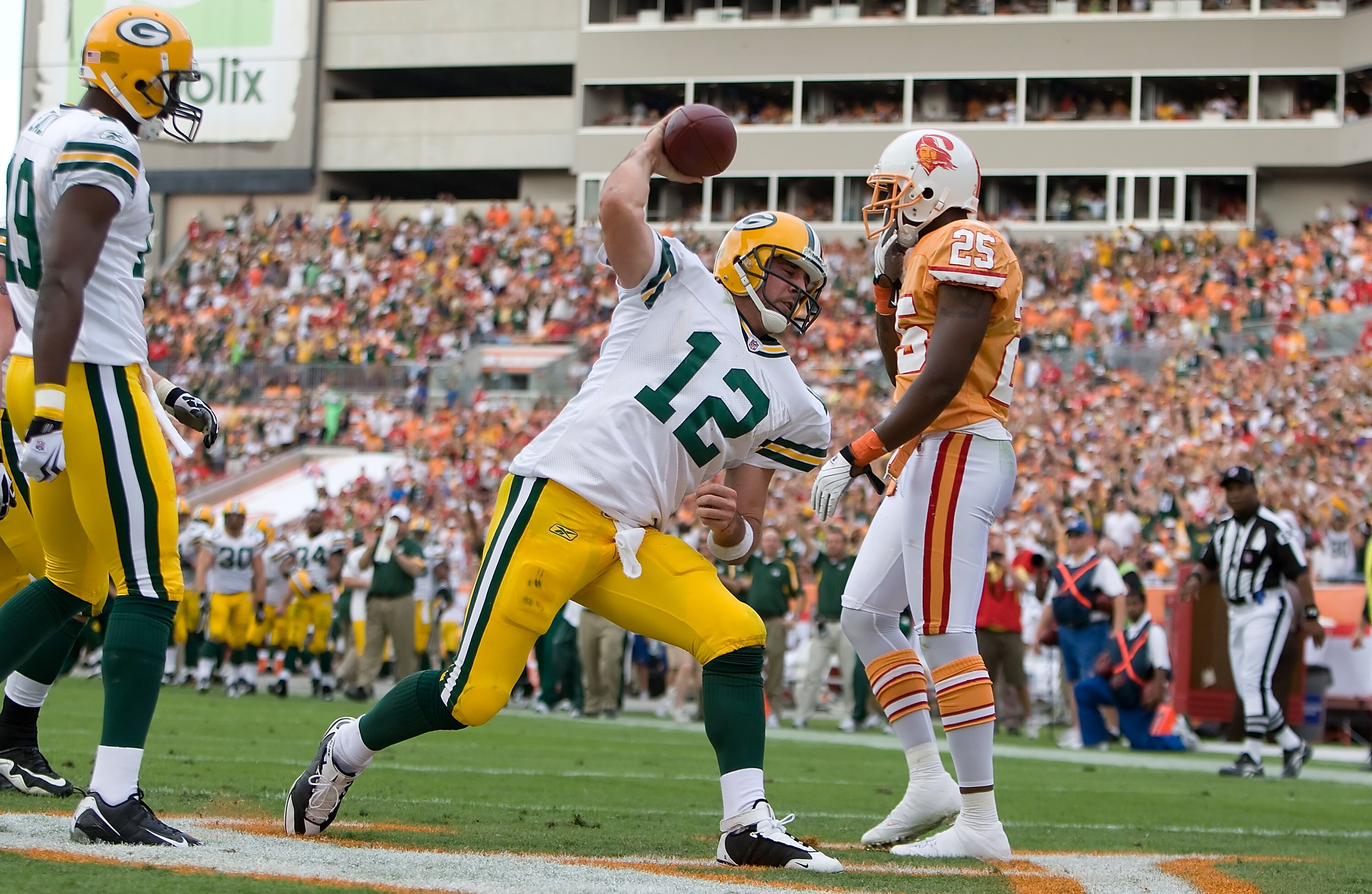 TAMPA, FL - NOVEMBER 08:  Quarterback Aaron Rodgers #12 of the Green Bay Packers spikes the ball after his fourth quarter touchdown against the Tampa Bay Buccaneers during the game at Raymond James Stadium on November 8, 2009 in Tampa, Florida.  (Photo by