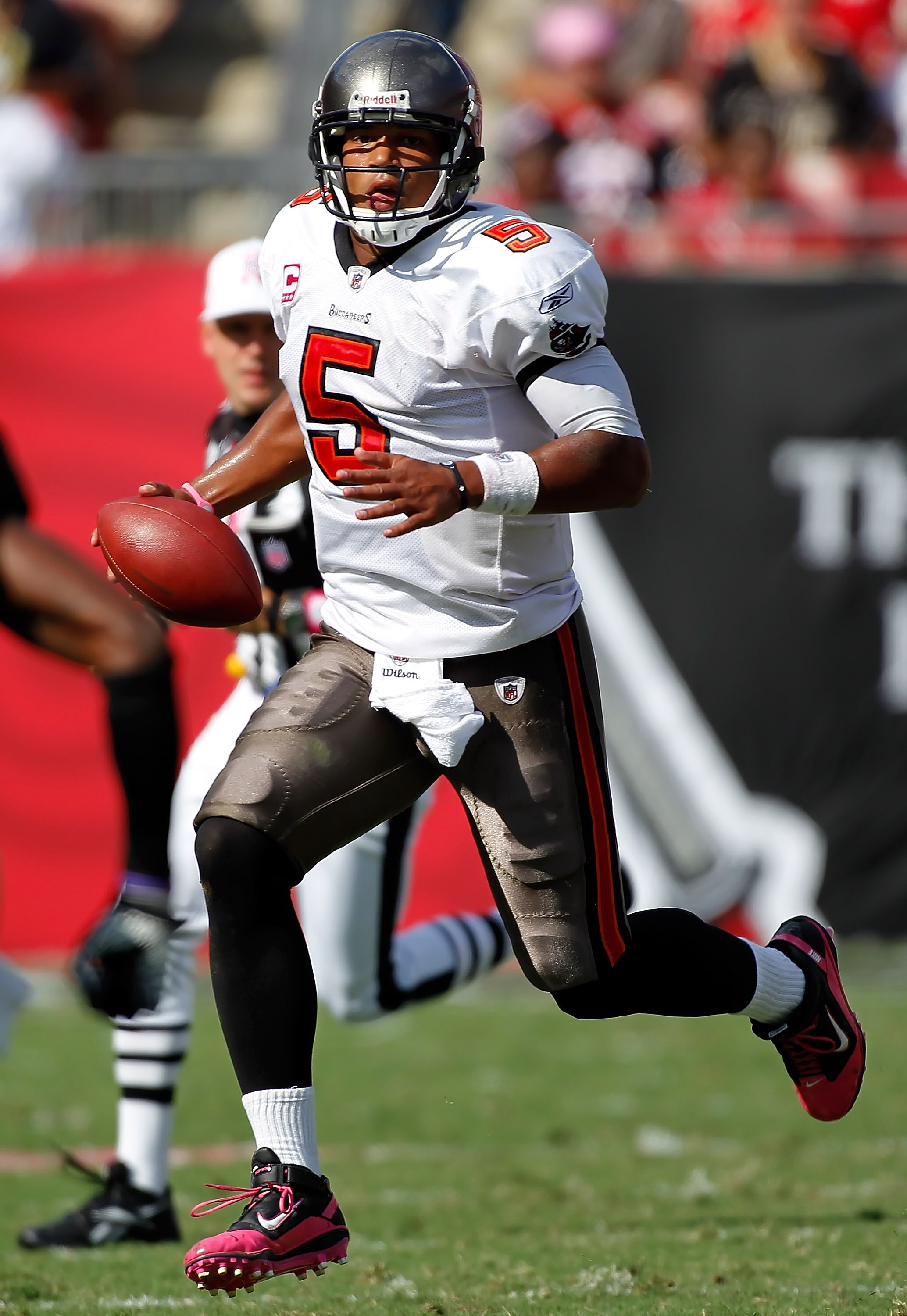 TAMPA, FL - OCTOBER 17:  Quarterback Josh Freeman #5 of the Tampa Bay Buccaneers runs the ball against the New Orleans Saints during the game at Raymond James Stadium on October 17, 2010 in Tampa, Florida.  (Photo by J. Meric/Getty Images)
