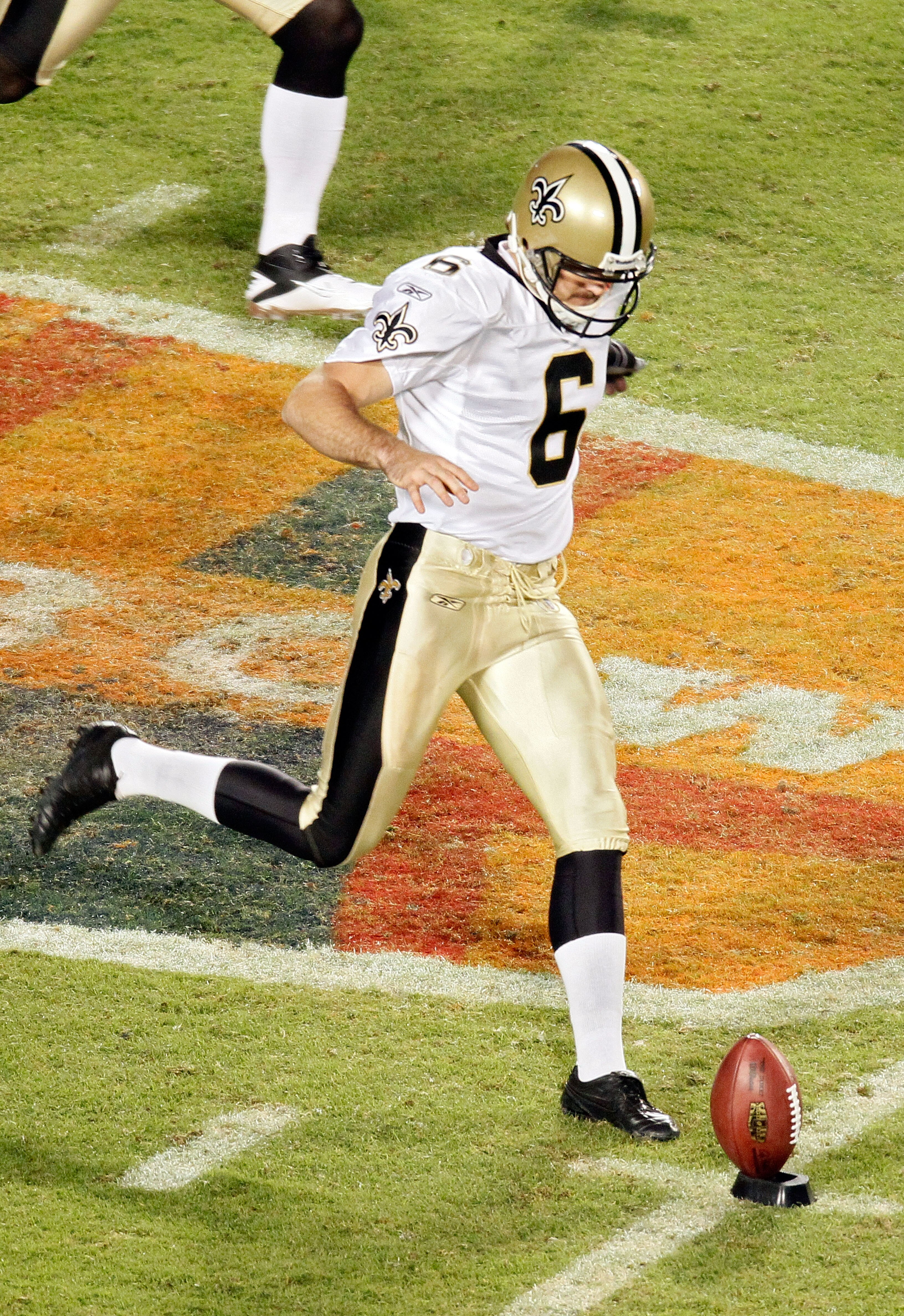 MIAMI GARDENS, FL - FEBRUARY 07:   Thomas Morstead #6 of the New Orleans Saints kicks an onside kick against of the Indianapolis Colts during Super Bowl XLIV on February 7, 2010 at Sun Life Stadium in Miami Gardens, Florida.  (Photo by Doug Benc/Getty Ima