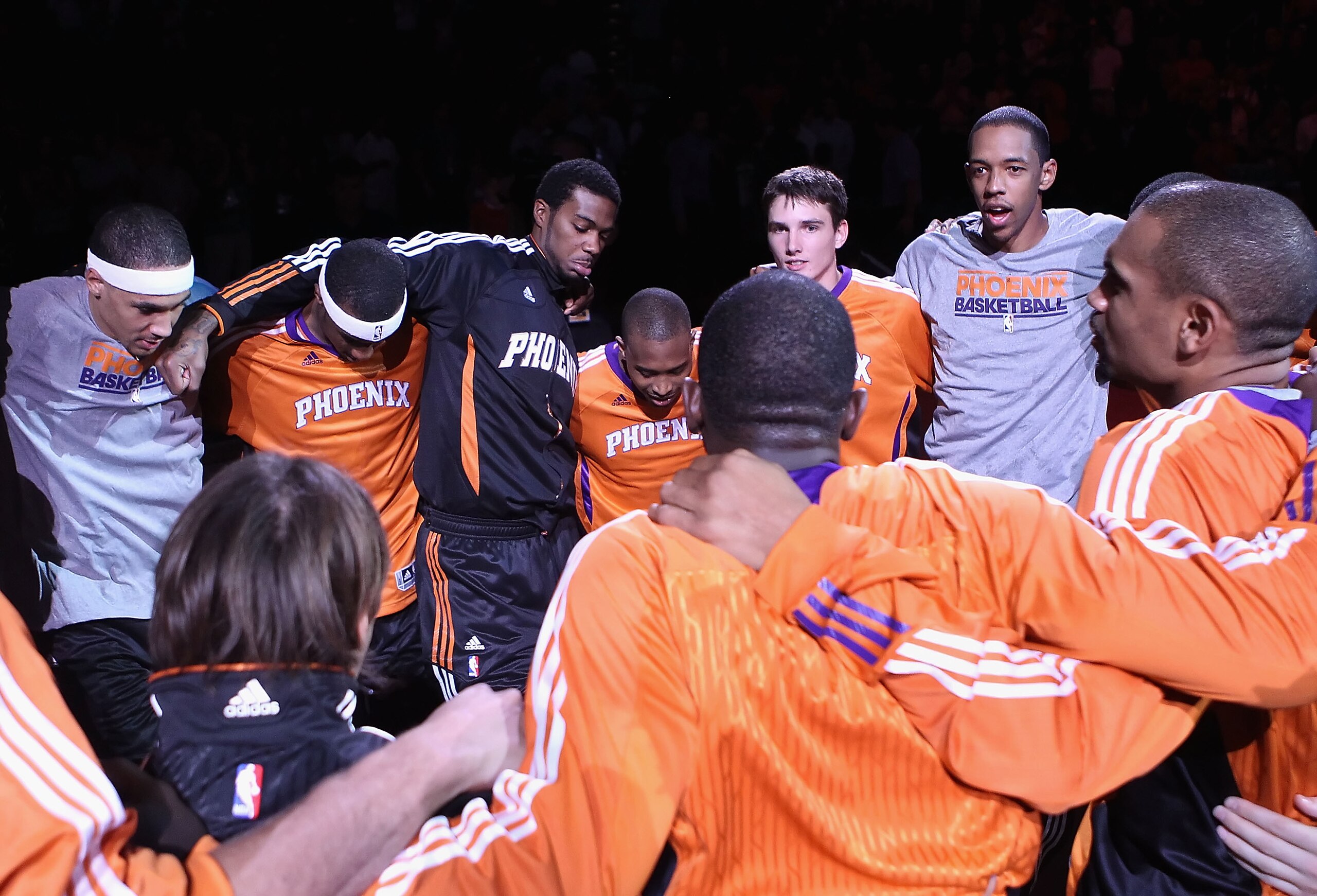 PHOENIX - OCTOBER 12:  The Phoenix Suns huddle up before the preseason NBA game against the Utah Jazz at US Airways Center on October 12, 2010 in Phoenix, Arizona. NOTE TO USER: User expressly acknowledges and agrees that, by downloading and or using this