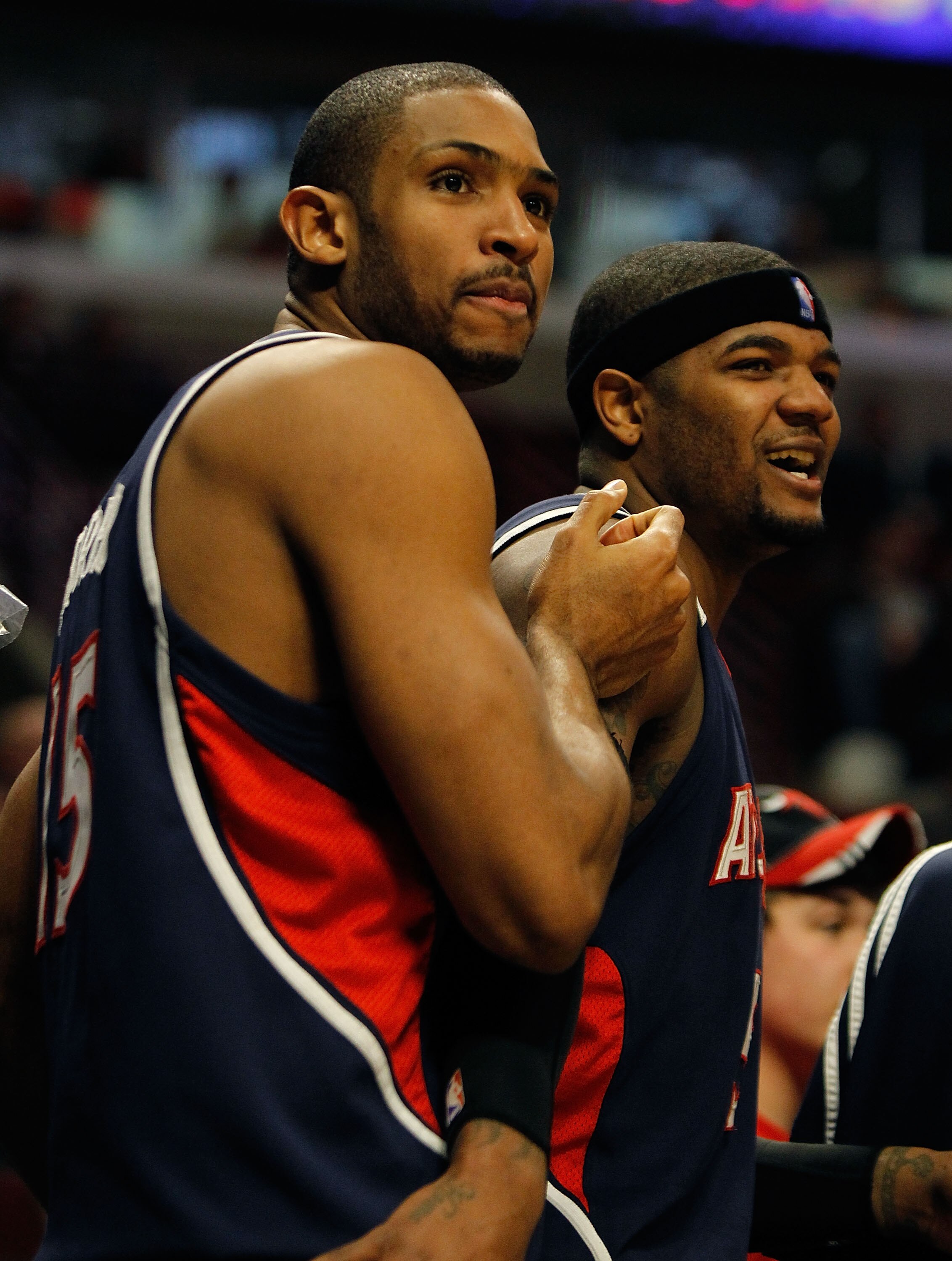 CHICAGO - MARCH 01: Al Horford #15 and Josh Smith #5 of the Atlanta Hawks react during the final minute of a win over the Chicago Bulls at the United Center on March 1, 2010 in Chicago, Illinois. The Hawks defeated the Bulls 116-92. NOTE TO USER: User exp