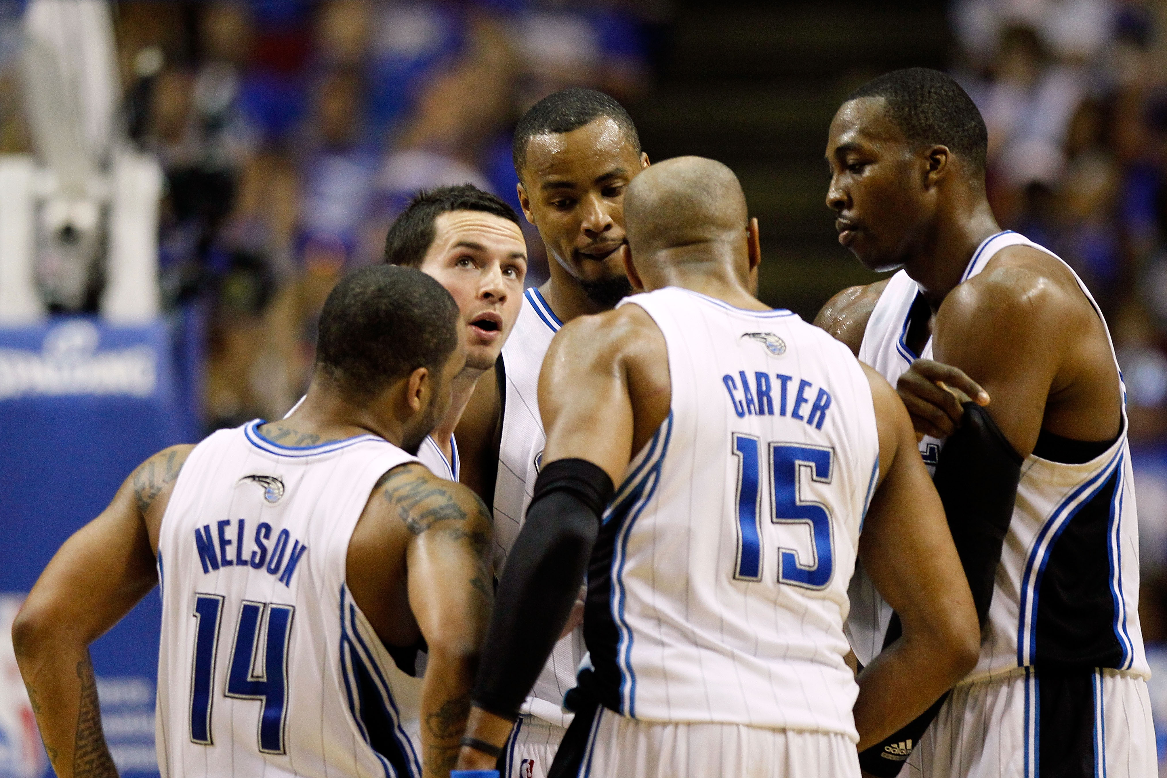 ORLANDO, FL - MAY 16:  (L-R) Jameer Nelson #14, J.J. Redick #7, Rashard Lewis #9, Vince Carter #15 and Dwight Howard #12 of the Orlando Magic huddle up against the Boston Celtics in Game One of the Eastern Conference Finals during the 2010 NBA Playoffs at