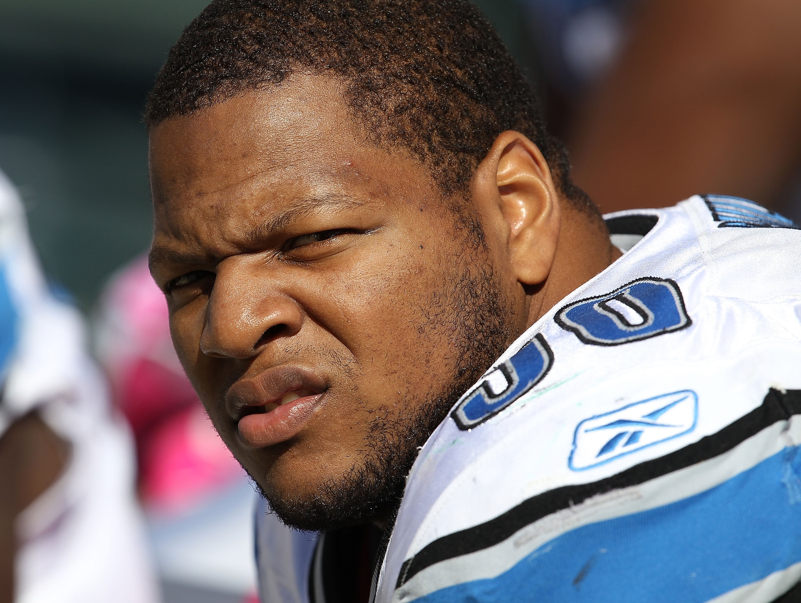 GREEN BAY, WI - OCTOBER 03: Ndamukong Suh #90 of the Detroit Lions rests on the bench during a game against the Green Bay Packers at Lambeau Field on October 3, 2010 in Green Bay, Wisconsin. The Packers defeated the Lions 28-26. (Photo by Jonathan Daniel/
