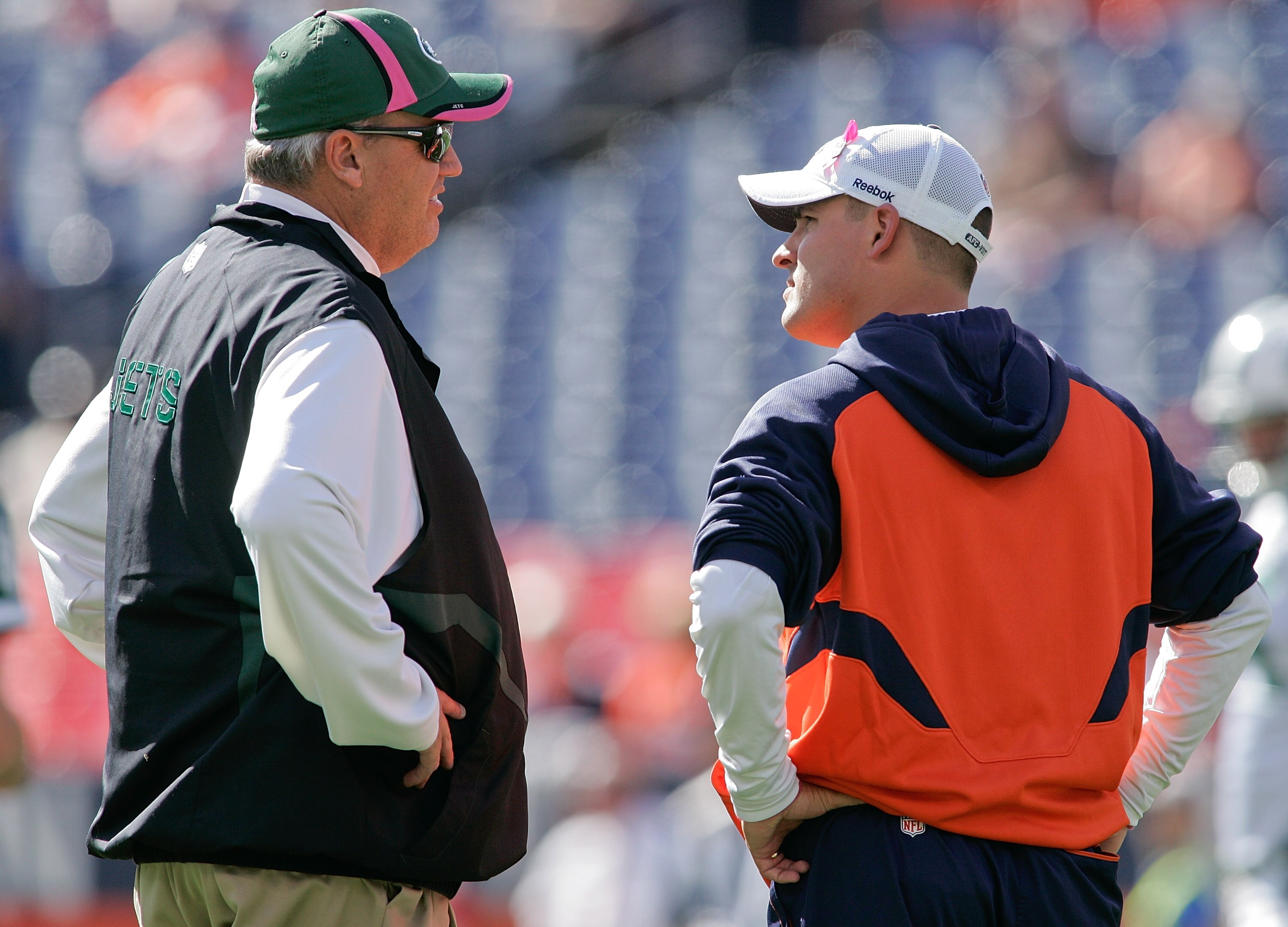 DENVER - OCTOBER 17: Head coach Rex Ryan of the New York Jets talks with head coach Josh McDaniels of the Denver Broncos before the game at INVESCO Field at Mile High on October 17, 2010 in Denver, Colorado.  (Photo by Justin Edmonds/Getty Images)