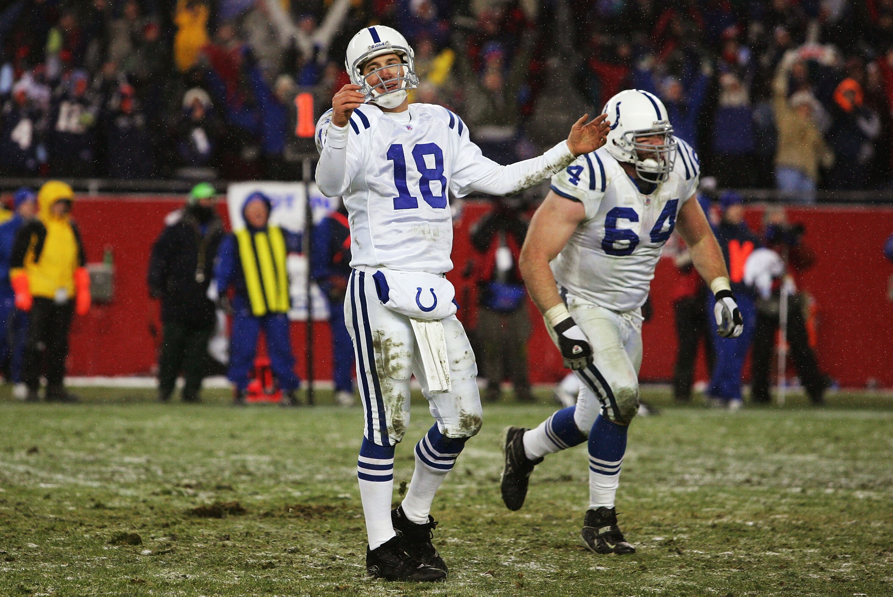 FOXBORO, MA - JANUARY 16:  Quarterback Peyton Manning #18 of the Indianapolis Colts reacts after throwing an interception against the New England Patriots during the AFC divisional playoff game at Gillette Stadium on January 16, 2005 in Foxboro, Massachus