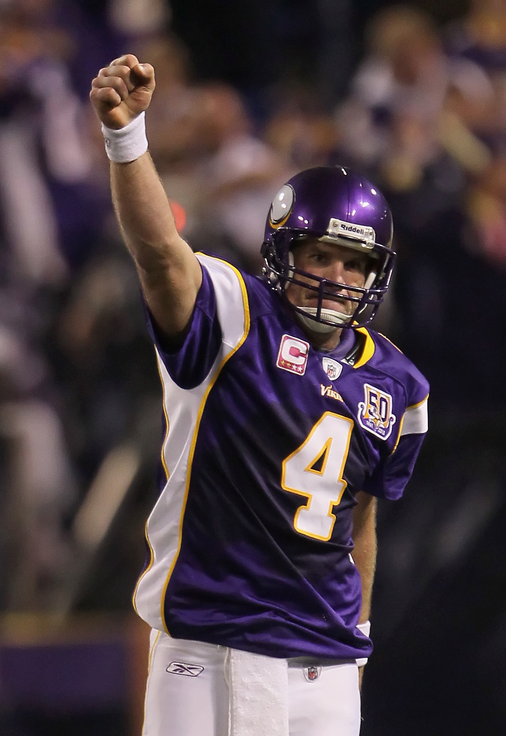 MINNEAPOLIS - OCTOBER 17:  Quarterback Brett Favre #4 of the Minnesota Vikings celebrates a pass interference call against Mike Jenkins (not pictured) of the Dallas Cowboys during the fourth quarter at Mall of America Field on October 17, 2010 in Minneapo