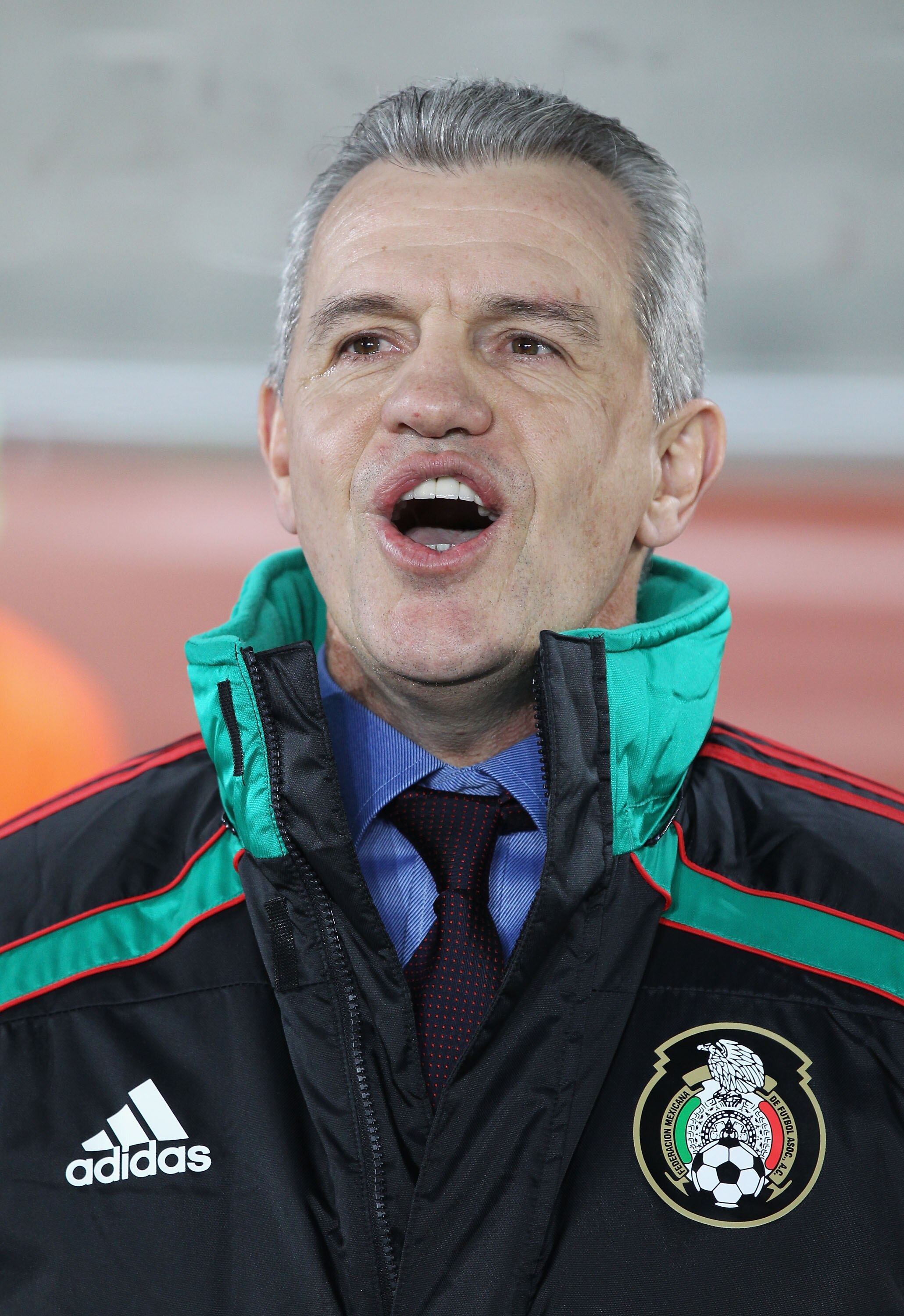 POLOKWANE, SOUTH AFRICA - JUNE 17:  Javier Aguirre head coach of Mexico sings the national anthem ahead of the 2010 FIFA World Cup South Africa Group A match between France and Mexico at the Peter Mokaba Stadium on June 17, 2010 in Polokwane, South Africa