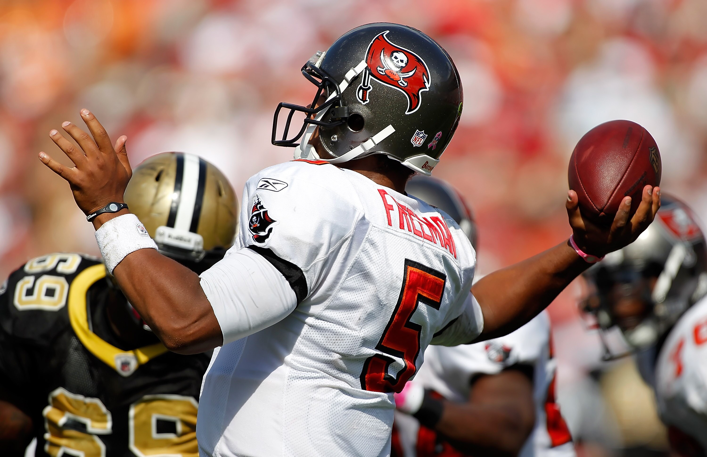 TAMPA, FL - OCTOBER 17:  Quarterback Josh Freeman #5 of the Tampa Bay Buccaneers throws a pass against the New Orleans Saints during the game at Raymond James Stadium on October 17, 2010 in Tampa, Florida.  (Photo by J. Meric/Getty Images)