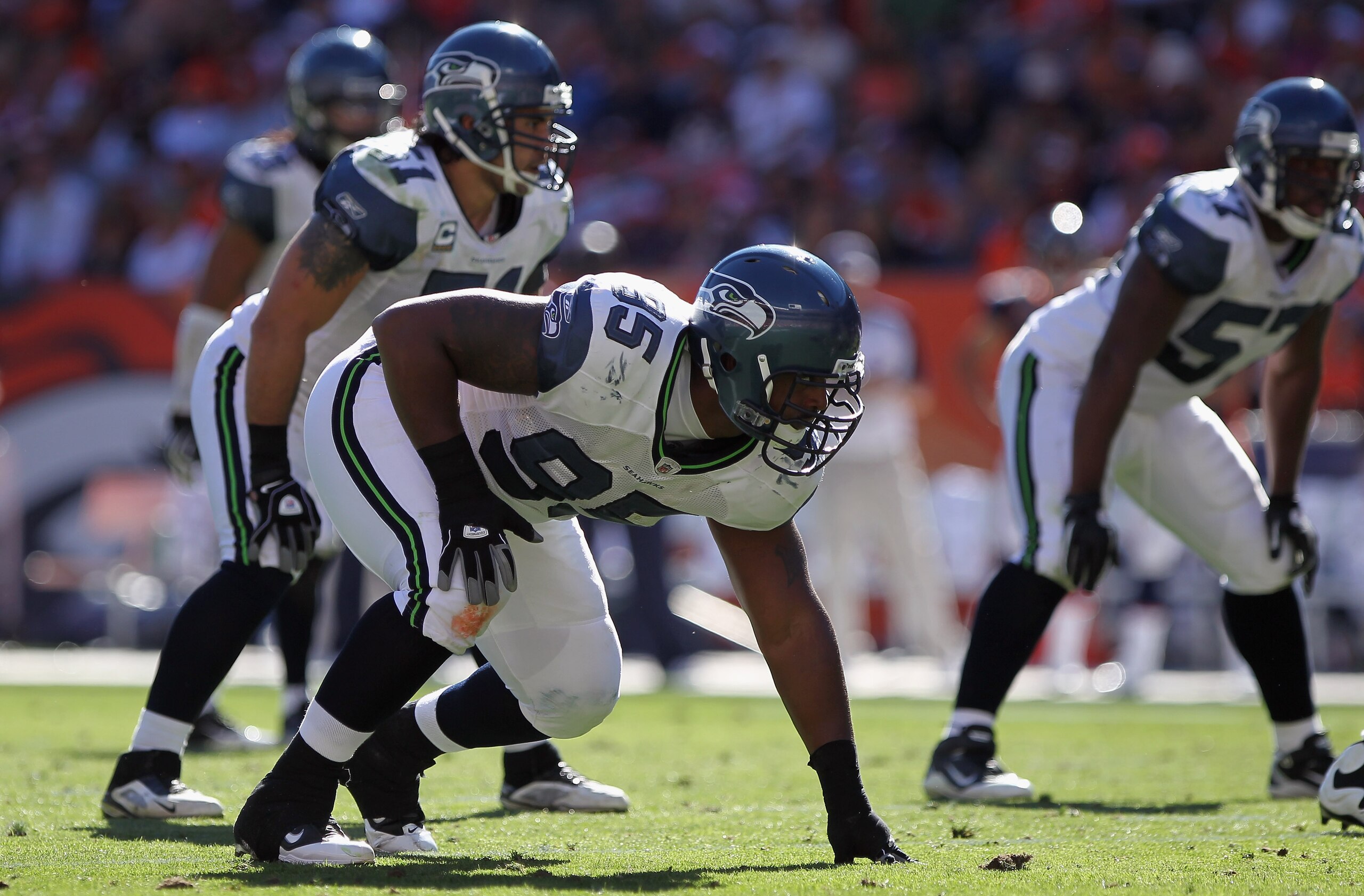 DENVER - SEPTEMBER 19:  Defensive tackle Kentwan Balmer #95 of the Seattle Seahawks awaits the snap against the Denver Broncos at INVESCO Field at Mile High on September 19, 2010 in Denver, Colorado The Broncos defeated the Seahawks 31-14..  (Photo by Dou