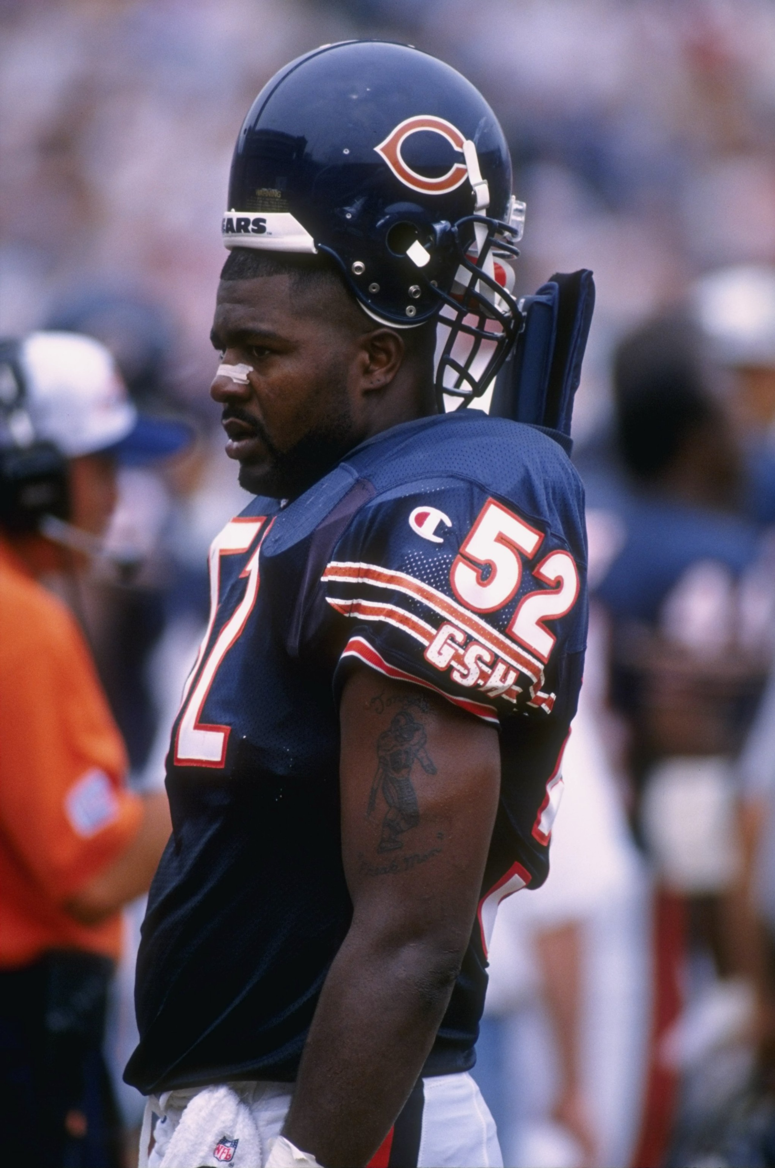11 Aug 1996:  Linebacker Bryan Cox of the Chicago Bears takes an opportunity to rest on the sideline during an offensive series in the Bears 24-21 victory over the Miami Dolphins at Soldier Field in Chicago, Illinois.  Mandatory Credit: Jonathan Daniel  /