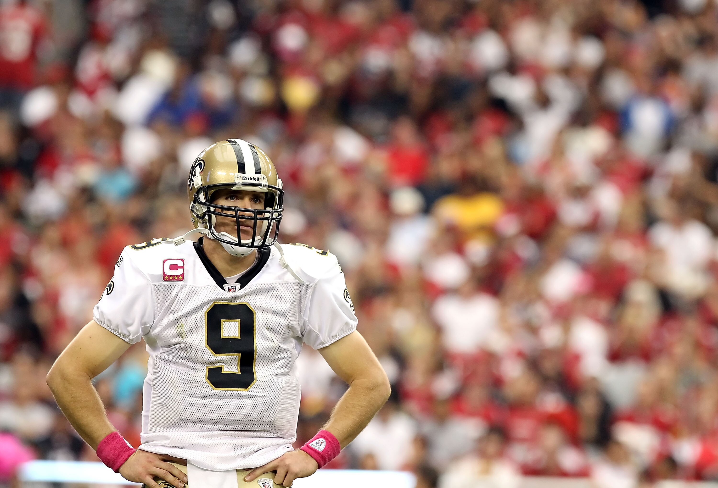 GLENDALE, AZ - OCTOBER 10:  Quarterback Drew Brees #9 of the New Orleans Saints looks over to the bench during the NFL game against the Arizona Cardinals at the University of Phoenix Stadium on October 10, 2010 in Glendale, Arizona. The Cardinals defeated