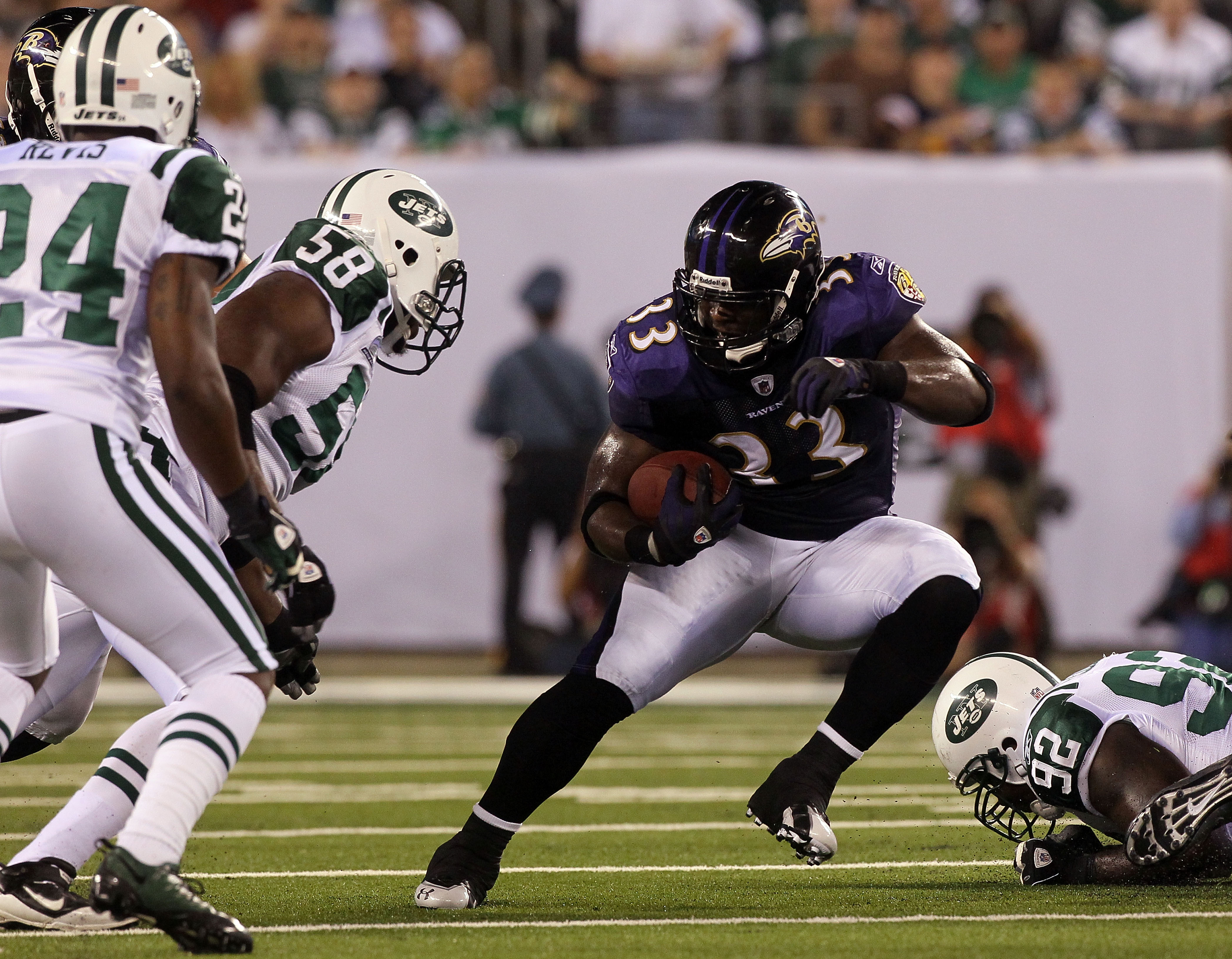 EAST RUTHERFORD, NJ - SEPTEMBER 13:  Willis McGahee #23 of the Baltimore Ravens runs against the New York Jets during their home opener at the New Meadowlands Stadium on September 13, 2010 in East Rutherford, New Jersey.  (Photo by Jim McIsaac/Getty Image