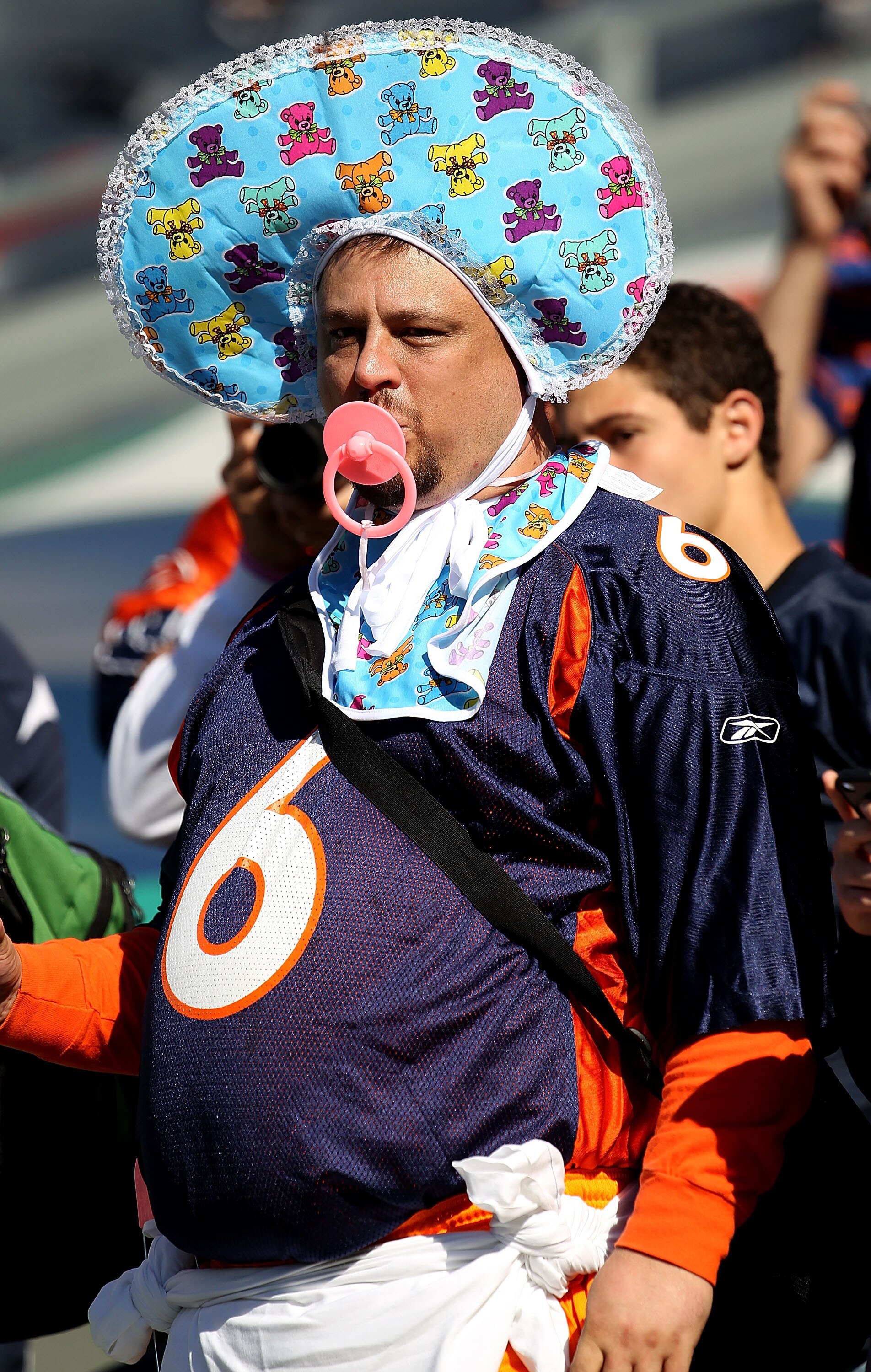 CHICAGO - OCTOBER 17: A fan of the Seattle Seahawks, dressed like a baby and wearing a Jay Culter/Denver Broncos jersey, watches warm-ups before the Seahawks take on the Chicago Bears  at Soldier Field on October 17, 2010 in Chicago, Illinois.  (Photo by