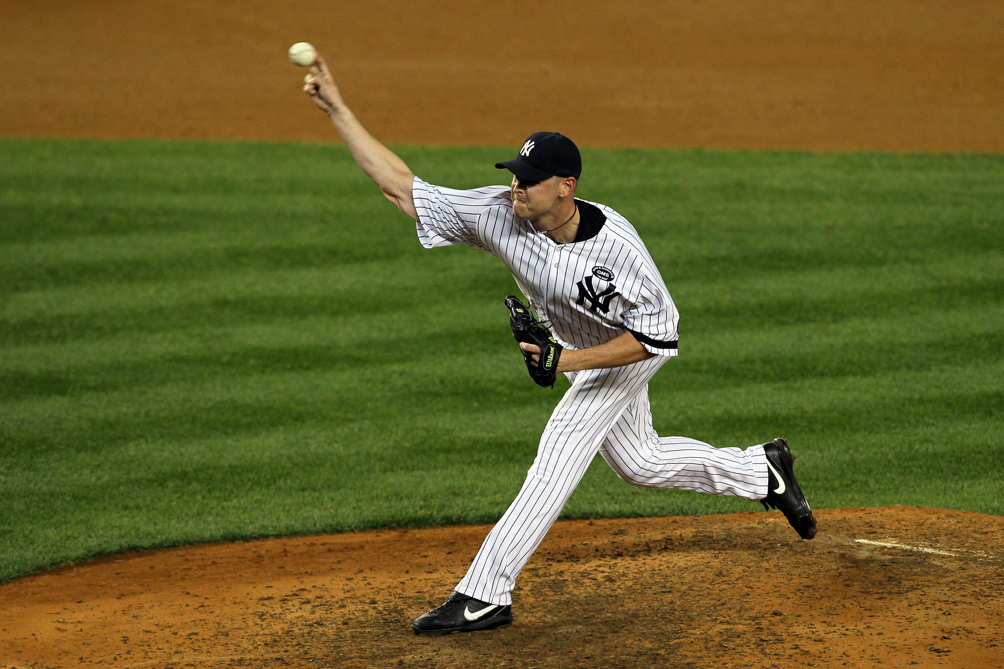 NEW YORK - OCTOBER 18:  Kerry Wood #39 of the New York Yankees pitches against the Texas Rangers in Game Three of the ALCS during the 2010 MLB Playoffs at Yankee Stadium on October 18, 2010 in New York, New York.  (Photo by Jim McIsaac/Getty Images)