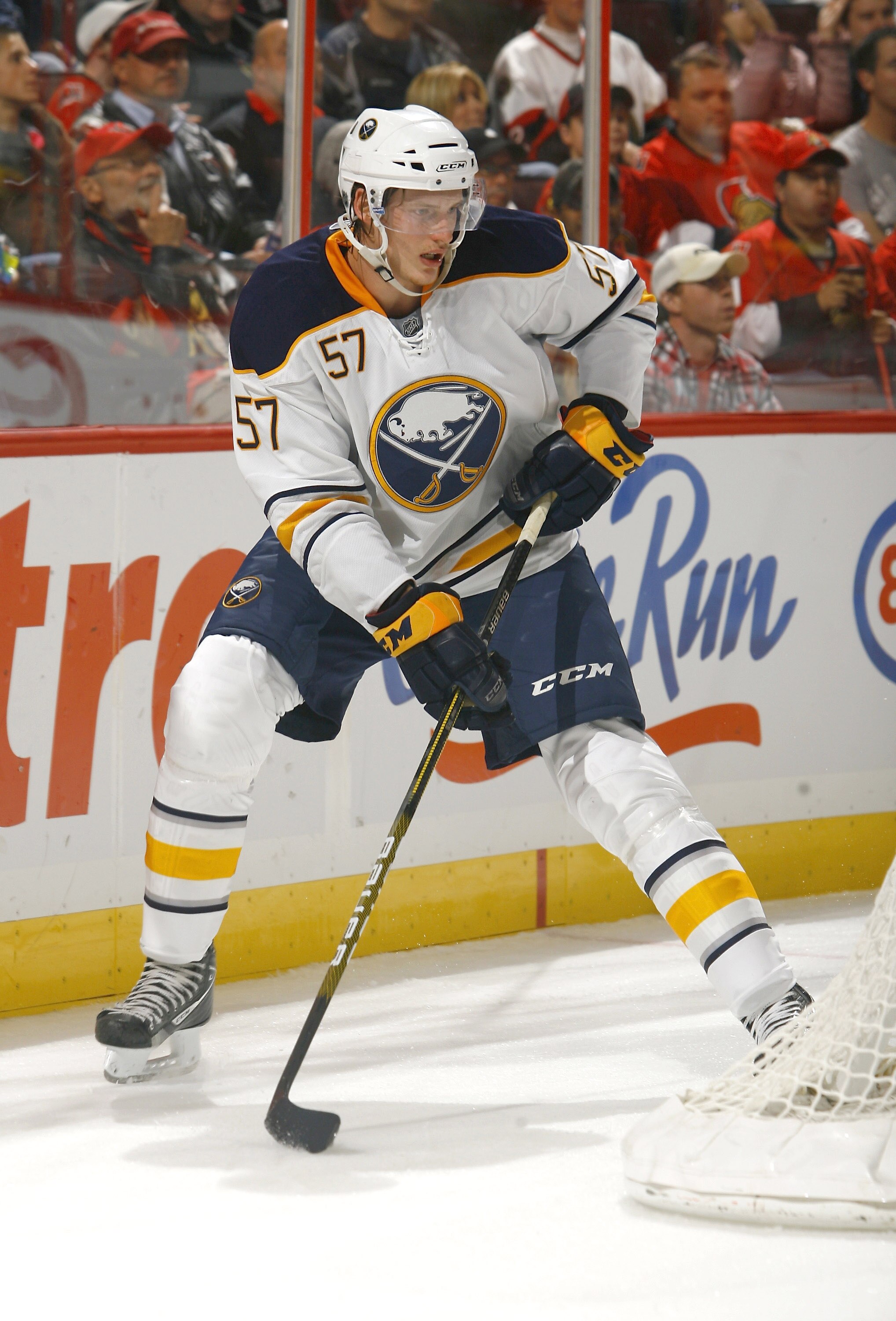 OTTAWA, ON - OCTOBER 08:  Tyler Myers #57 of the Buffalo Sabres carries the puck behind his net in a game against the Ottawa Senators  at Scotiabank Place on October 8, 2010 in Ottawa, Ontario,  Canada. The Buffalo Sabres defeated the Ottawa Senators 2-1.