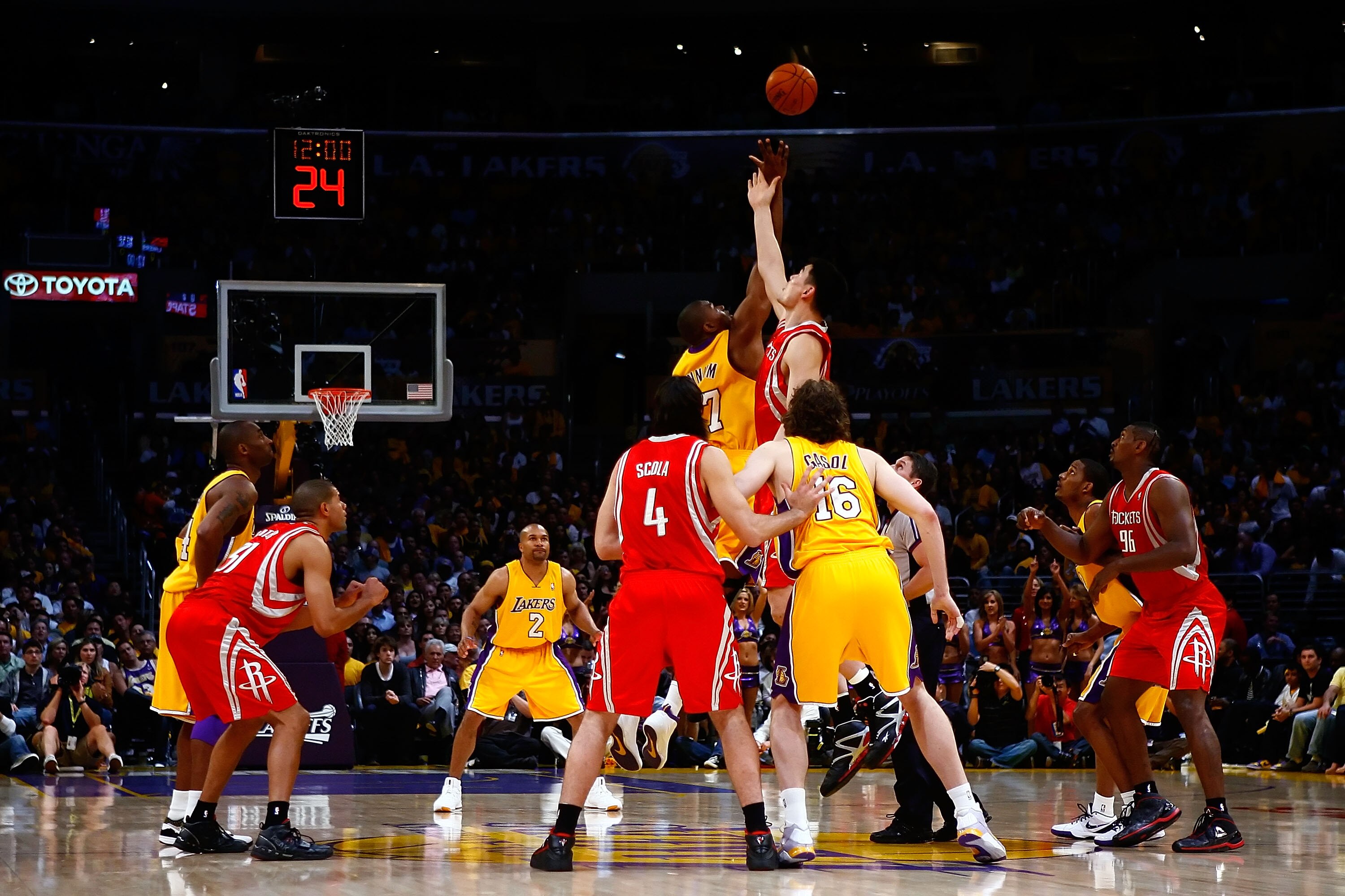LOS ANGELES, CA - MAY 04:  Andrew Bynum #17 of the Los Angeles Lakers and Yao Ming #11 of the Houston Rockets go after the opening tip-off in Game One of the Western Conference Semifinals during the 2009 NBA Playoffs at Staples Center on May 4, 2009 in Lo