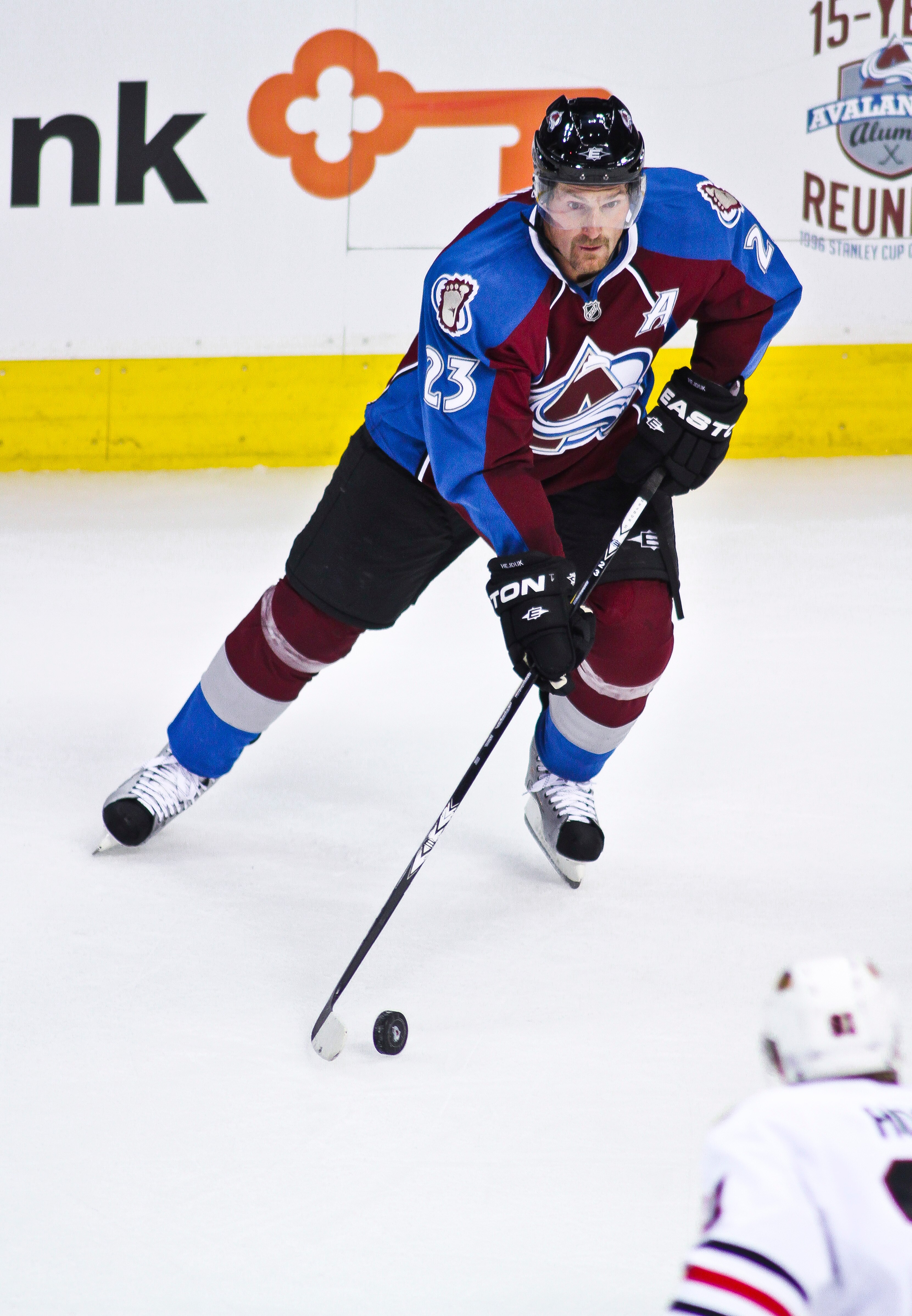 DENVER, CO - OCTOBER 7: Milan Hejduk #23 of the Colorado Avalanche looks to pass to a teammate while playing against the Chicago Blackhawks during both team's season openers at the Pepsi Center on October 7, 2010 in Denver, Colorado. The Avalanche won the