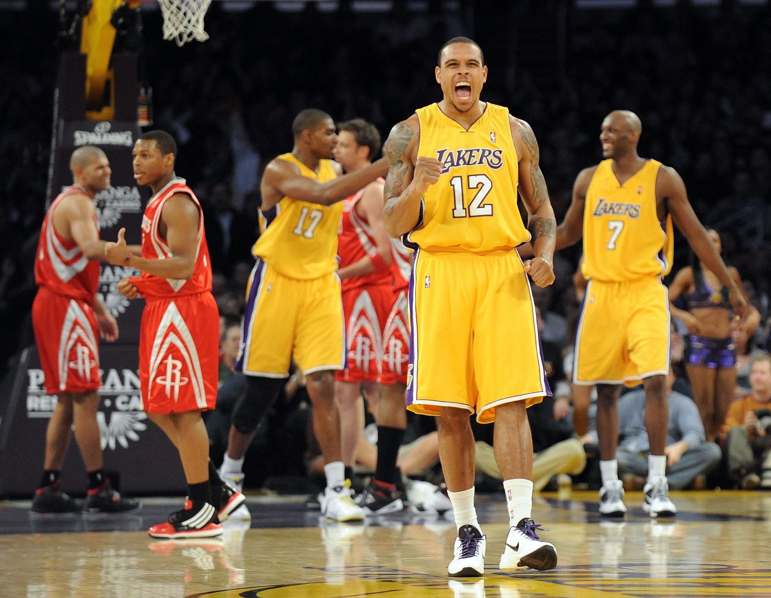 LOS ANGELES, CA - JANUARY 05:  Shannon Brown #12 of the Los Angeles Lakers celebrates a basket over theHouston Rockets on way to a 88-79 win during the game at Staples Center on January 5, 2010 in Los Angeles, California.  NOTE TO USER: User expressly ack