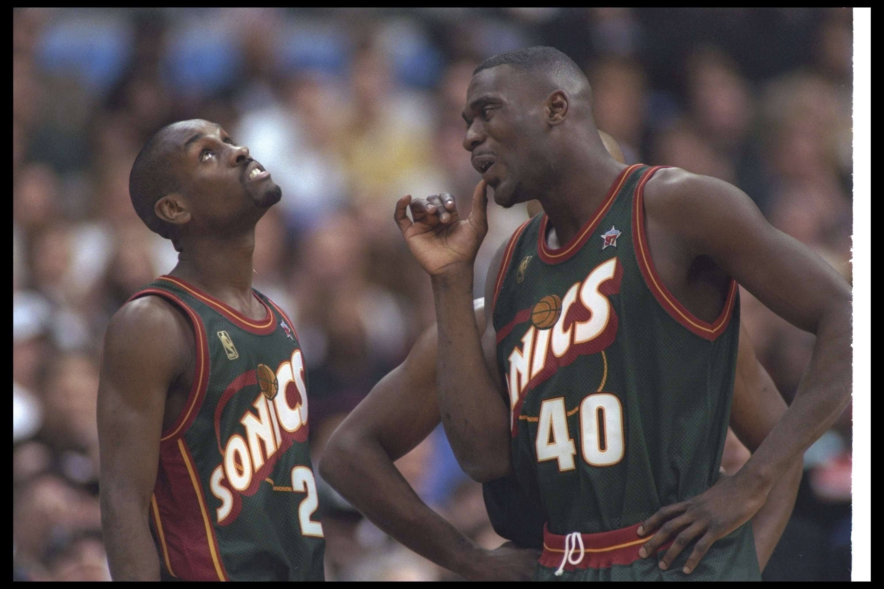 9 Feb 1997:  Seattle Supersonics forward Shawn Kemp (right) and guard Gary Payton confer during the NBA All-Star game in Cleveland, Ohio.  Mandatory Credit: Brian Bahr/Allsport